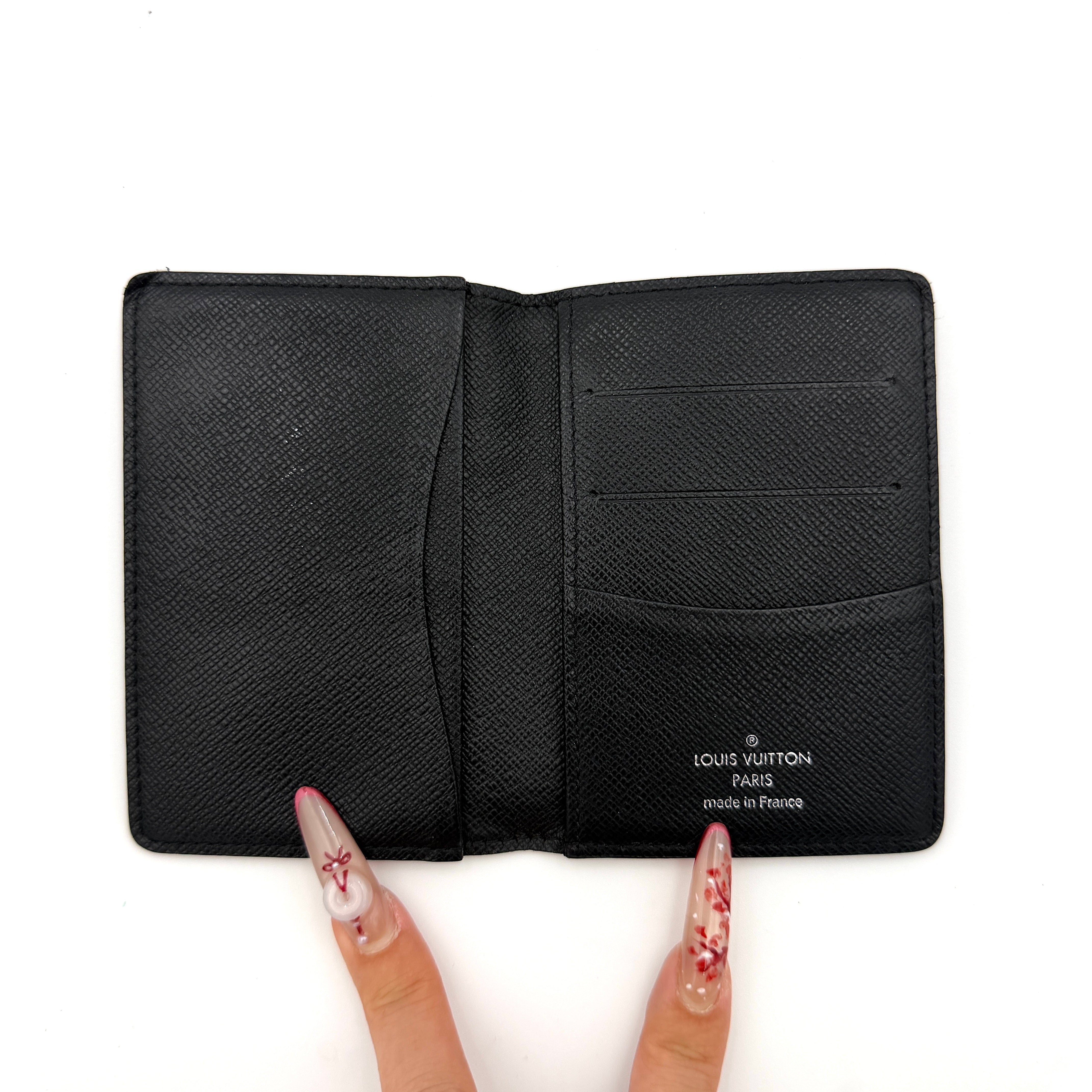 Louis Vuitton Damier Graphite Pocket Organizer in black coated canvas with tonal checkerboard pattern and slim profile.