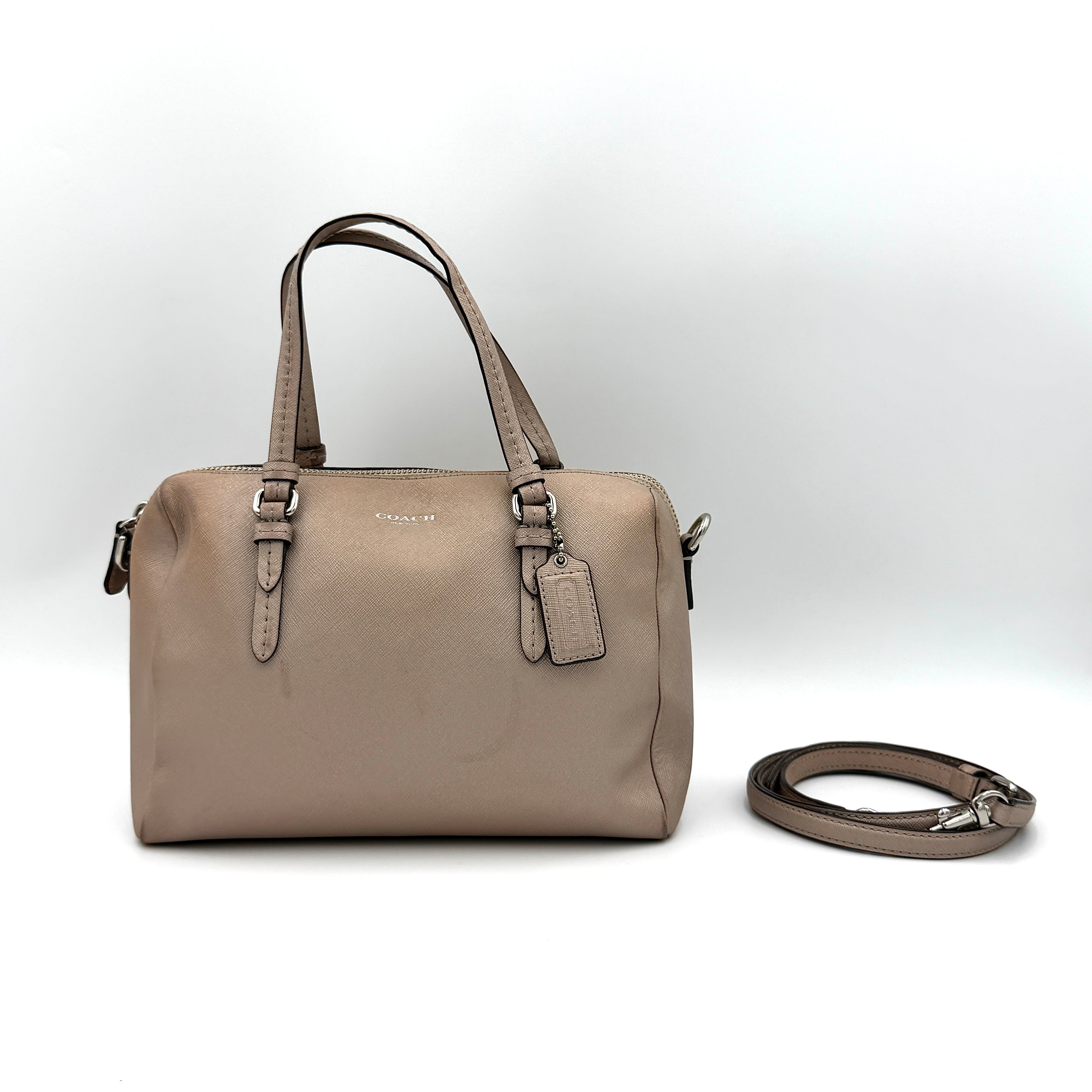 Coach Peyton Mini Bennett Boston Bag in light brown saffiano leather with silver-tone hardware, top handles, and a detachable strap.