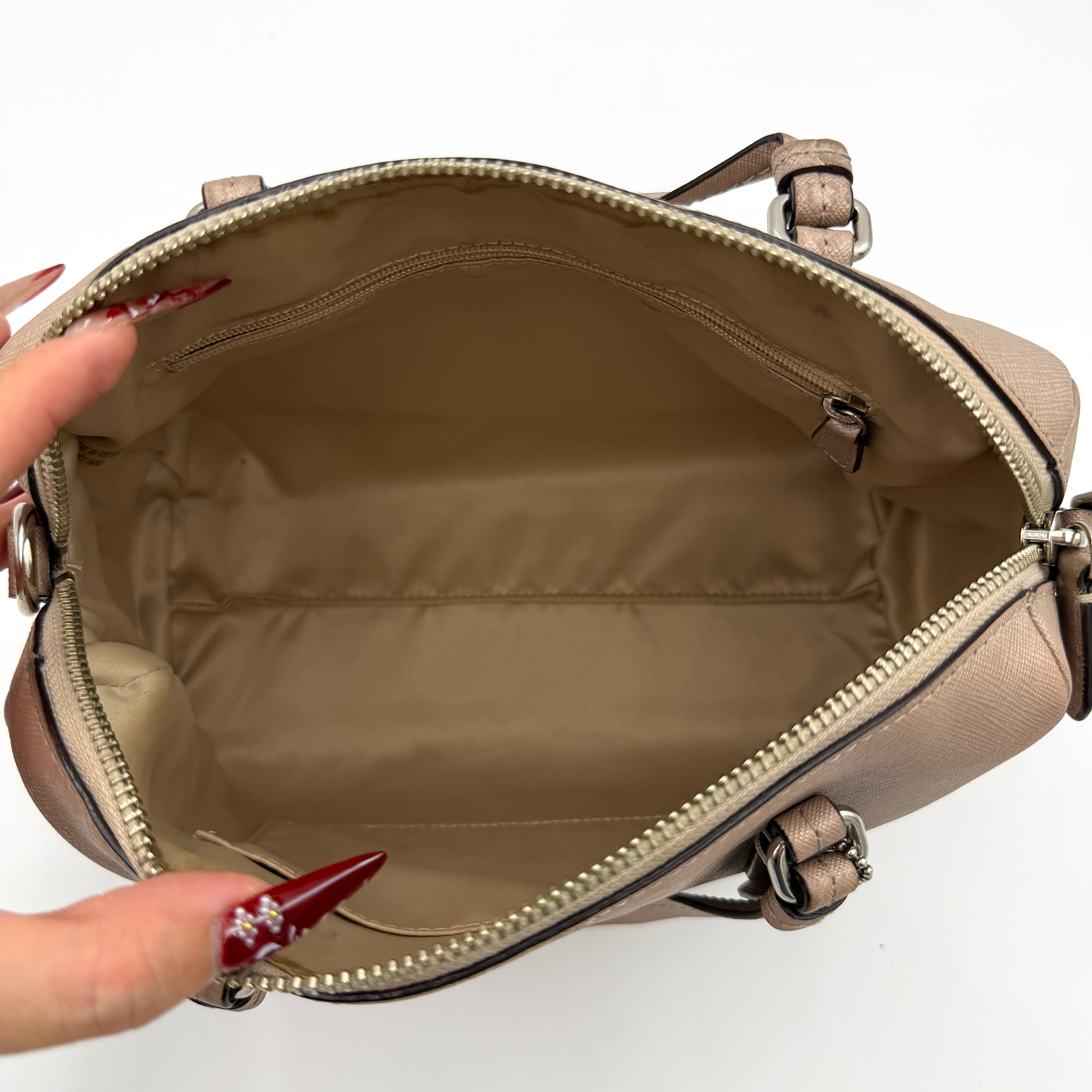 Coach Peyton Mini Bennett Boston Bag in light brown saffiano leather with silver-tone hardware, top handles, and a detachable strap.