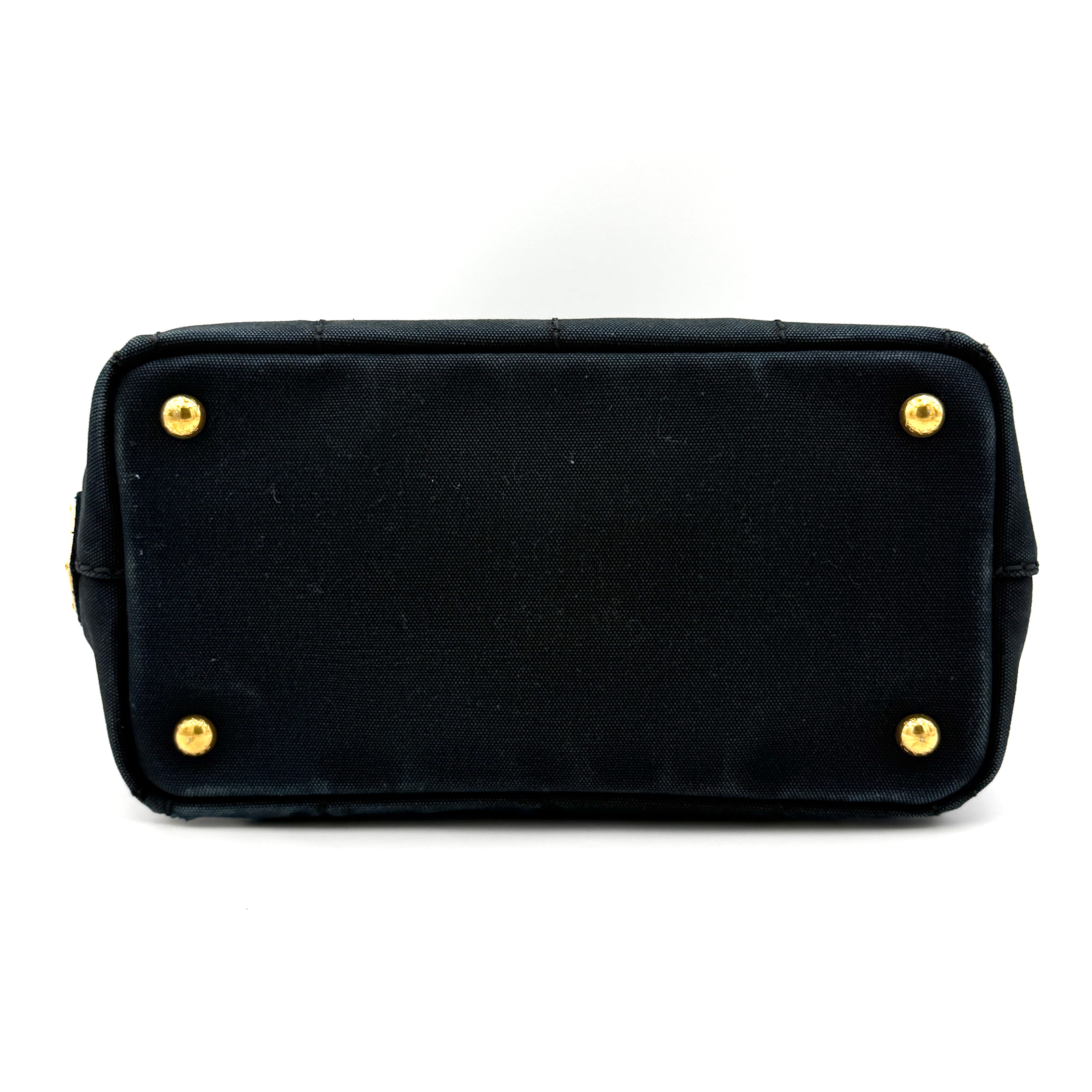 Front-facing Prada Canapa Embroidered Logo Tote in black canvas with ivory stitched logo and double handles.