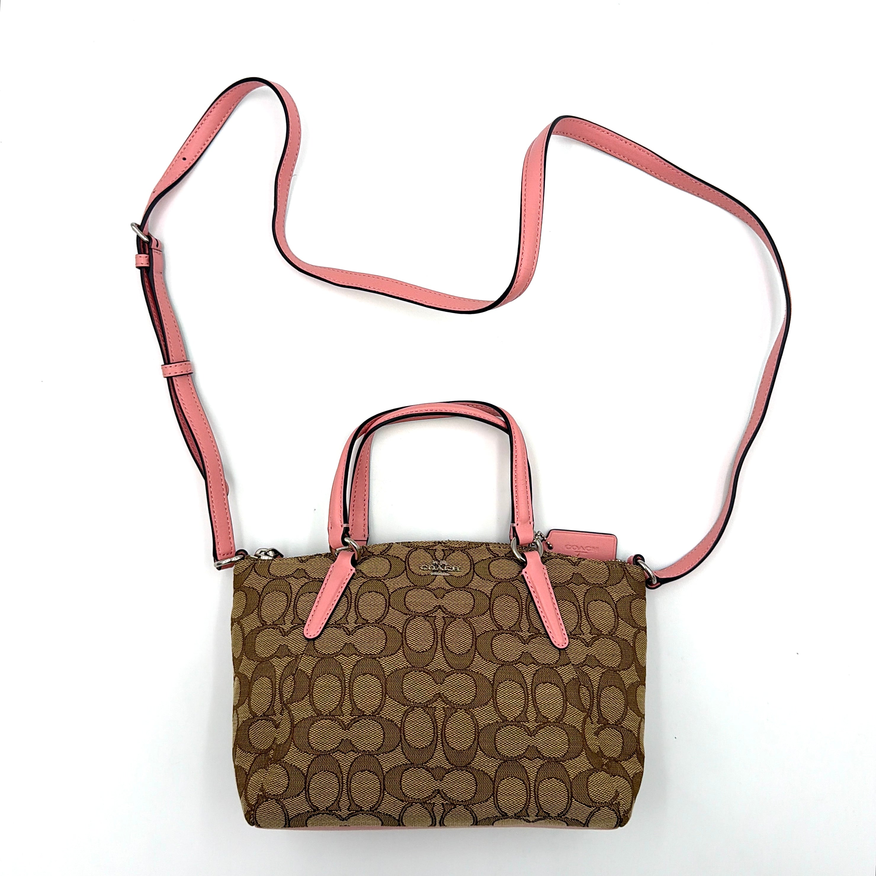 Coach 2Way Kelsey Shoulder Bag with beige monogram canvas and pink leather accents, shown with adjustable shoulder strap.
