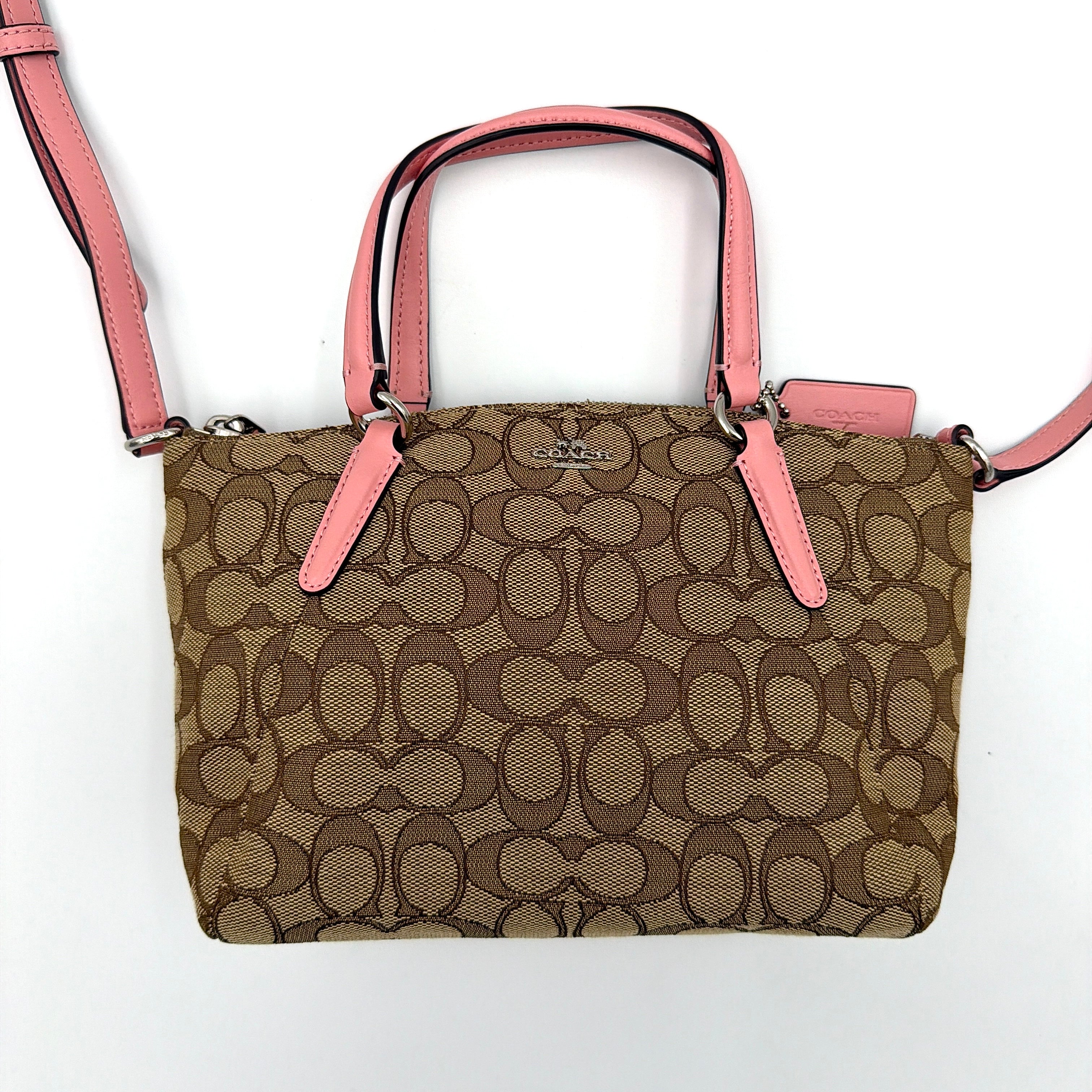 Coach 2Way Kelsey Shoulder Bag with beige monogram canvas and pink leather accents, shown with adjustable shoulder strap.