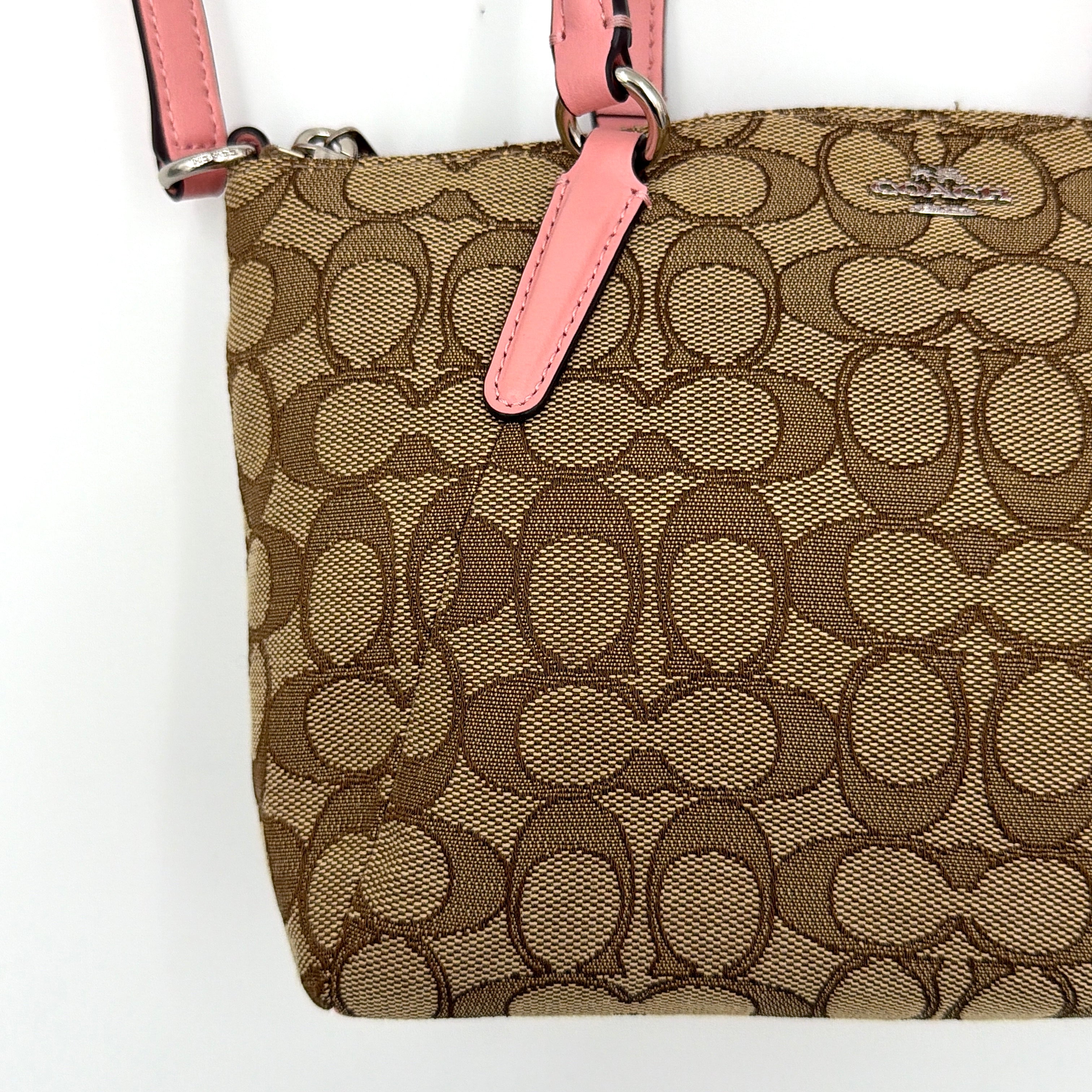 Coach 2Way Kelsey Shoulder Bag with beige monogram canvas and pink leather accents, shown with adjustable shoulder strap.