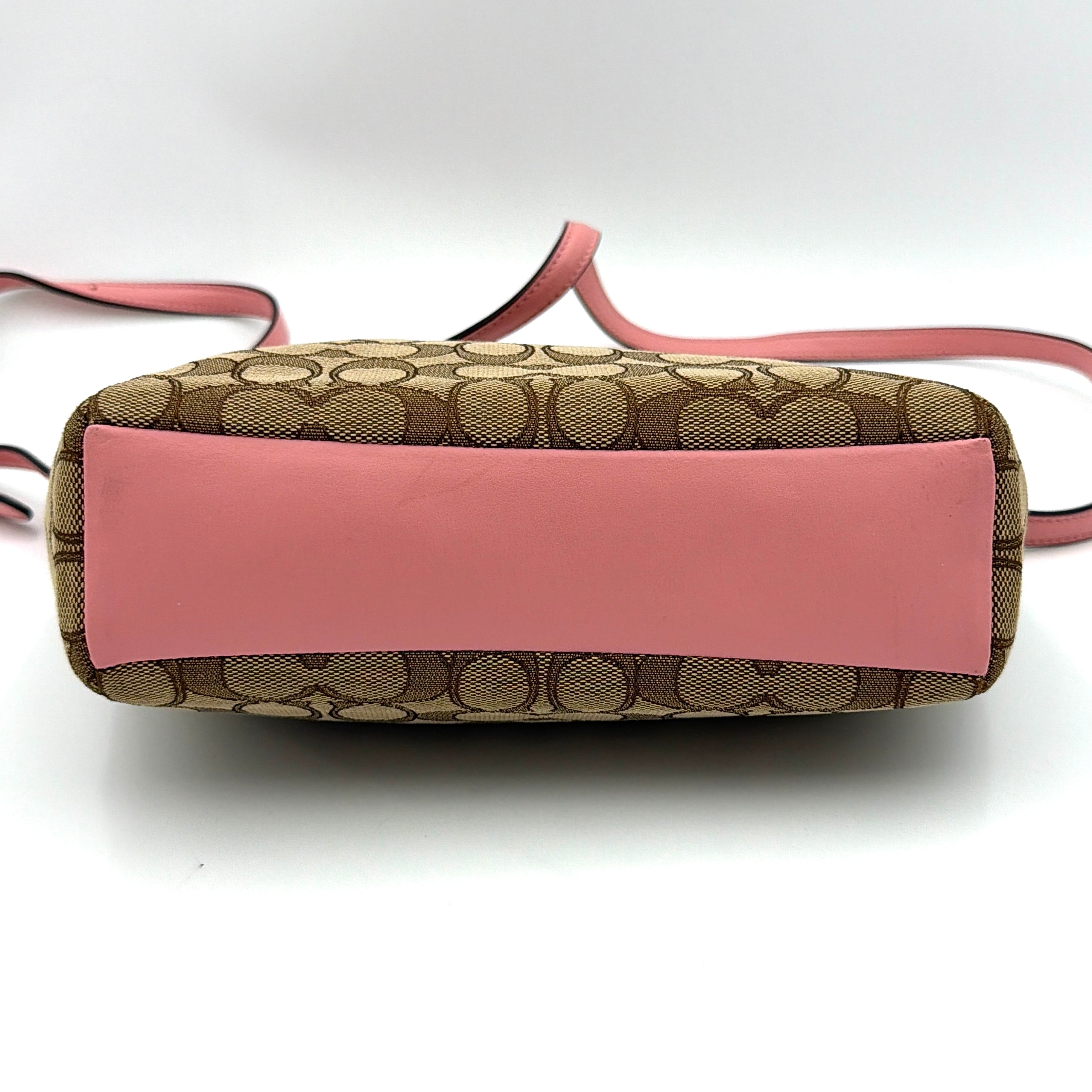 Coach 2Way Kelsey Shoulder Bag with beige monogram canvas and pink leather accents, shown with adjustable shoulder strap.