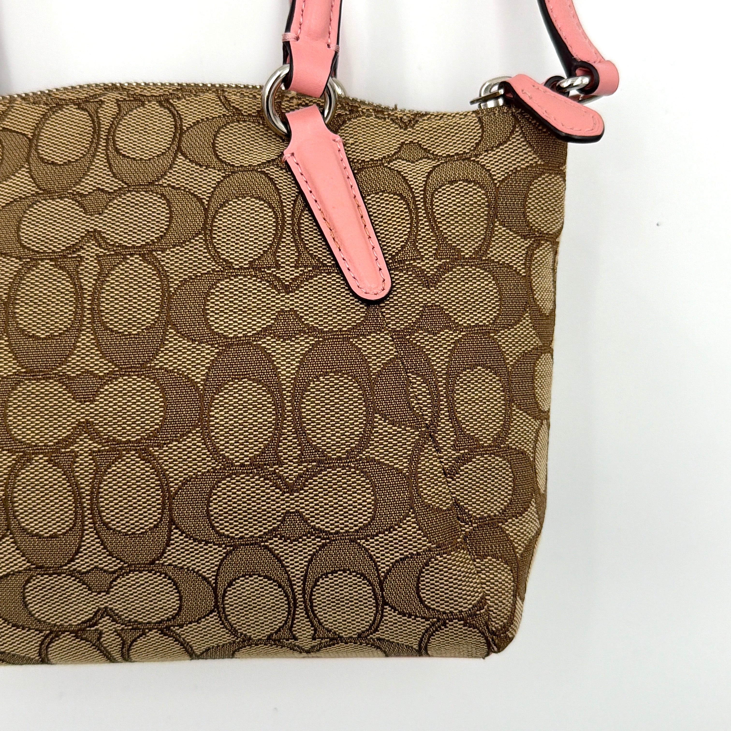 Coach 2Way Kelsey Shoulder Bag with beige monogram canvas and pink leather accents, shown with adjustable shoulder strap.