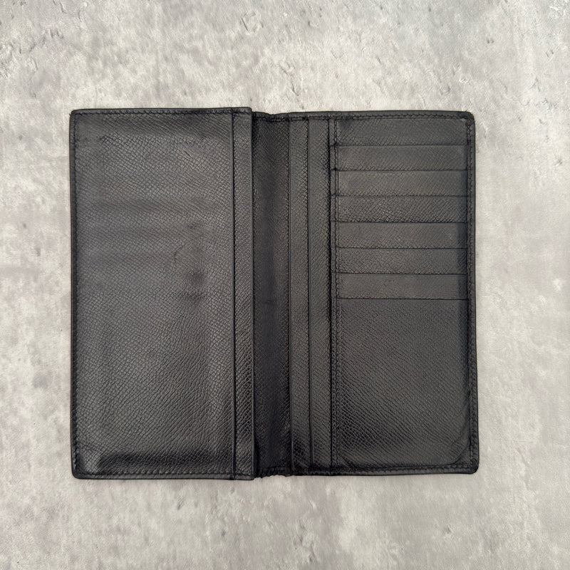 Bvlgari Bi-Fold Leather Black Long Wallet, crafted from textured black leather with multiple card slots and bill compartments for organization.