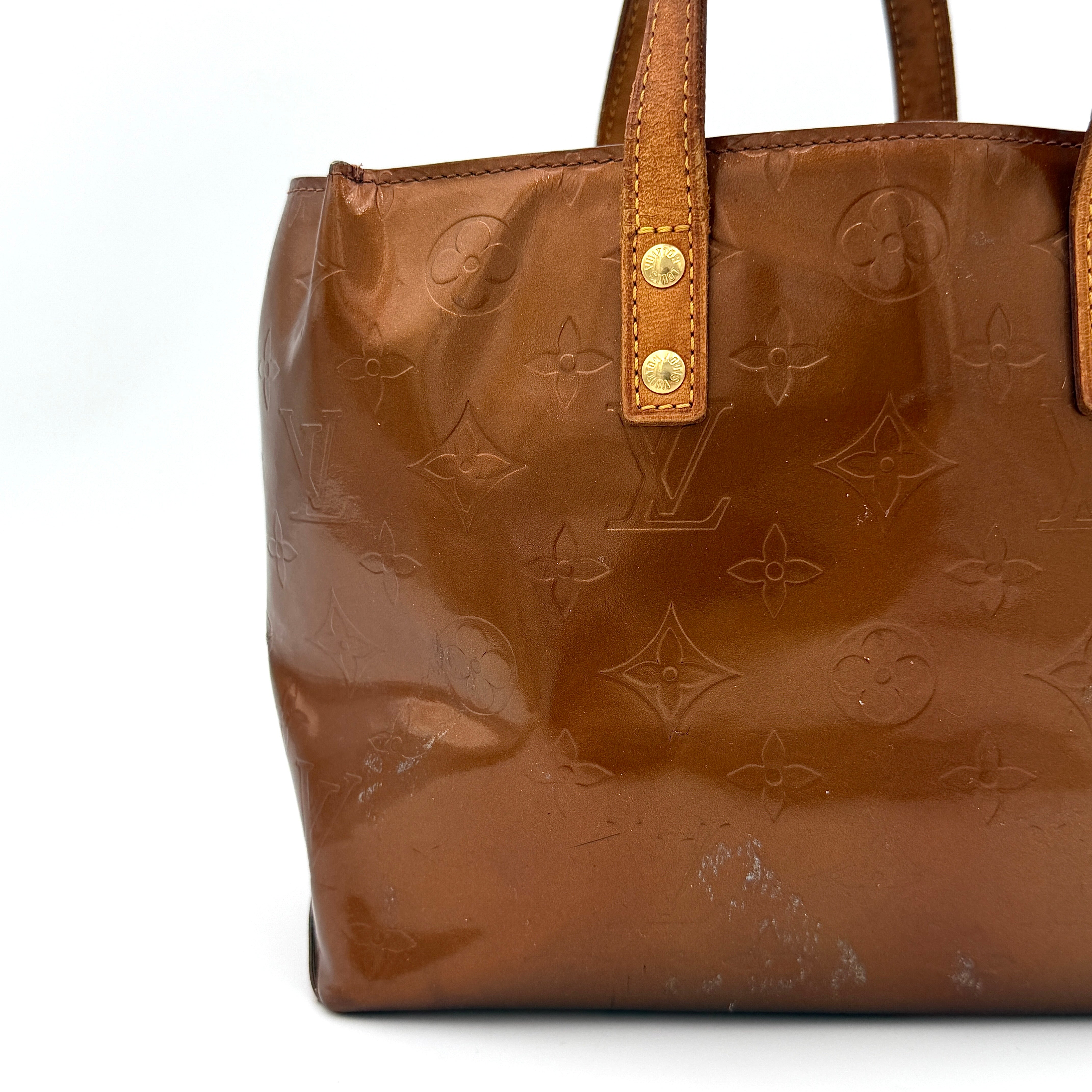 Louis Vuitton PM Vernis Reade Shoulder Bag in glossy bronze patent leather with monogram embossing and structured silhouette.