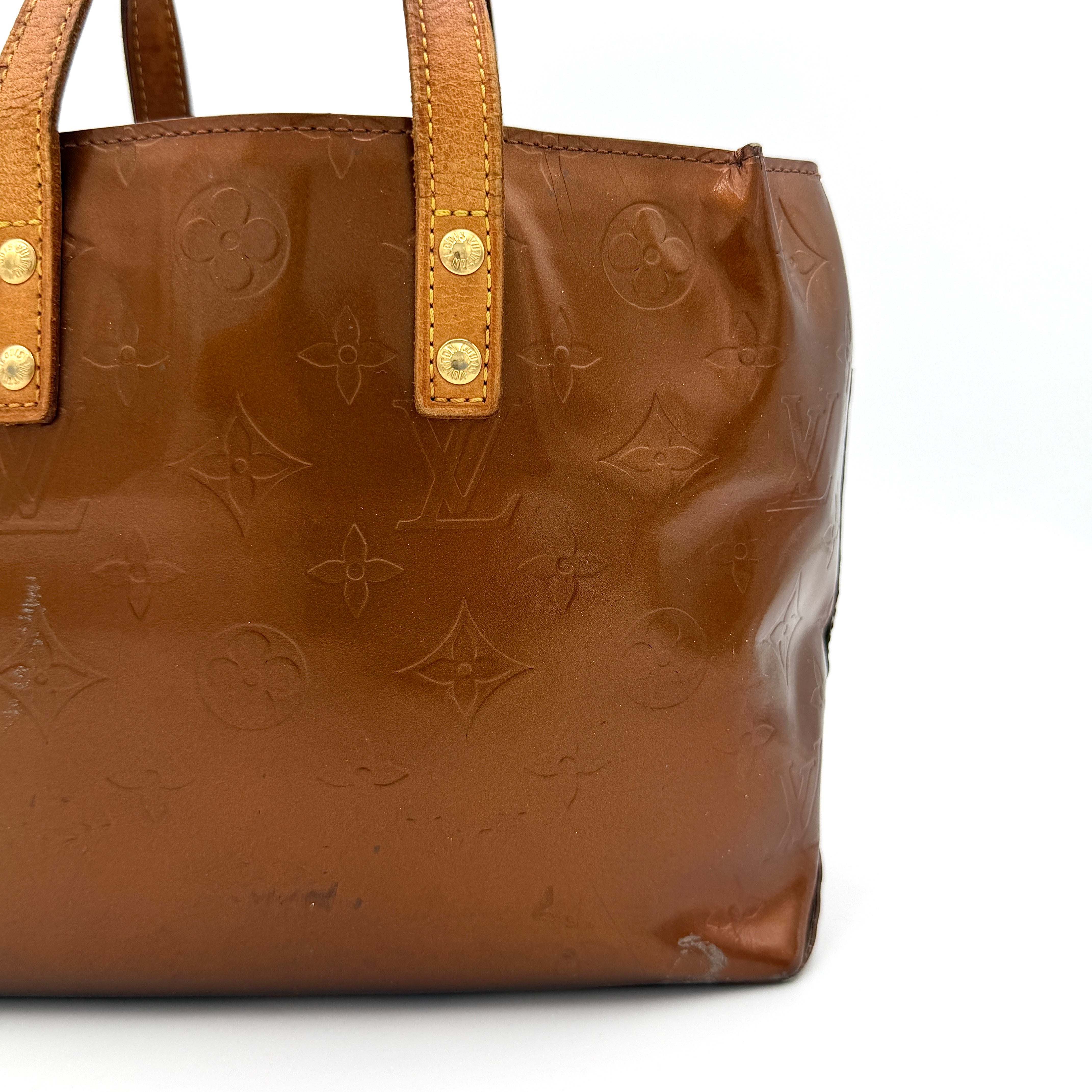 Louis Vuitton PM Vernis Reade Shoulder Bag in glossy bronze patent leather with monogram embossing and structured silhouette.