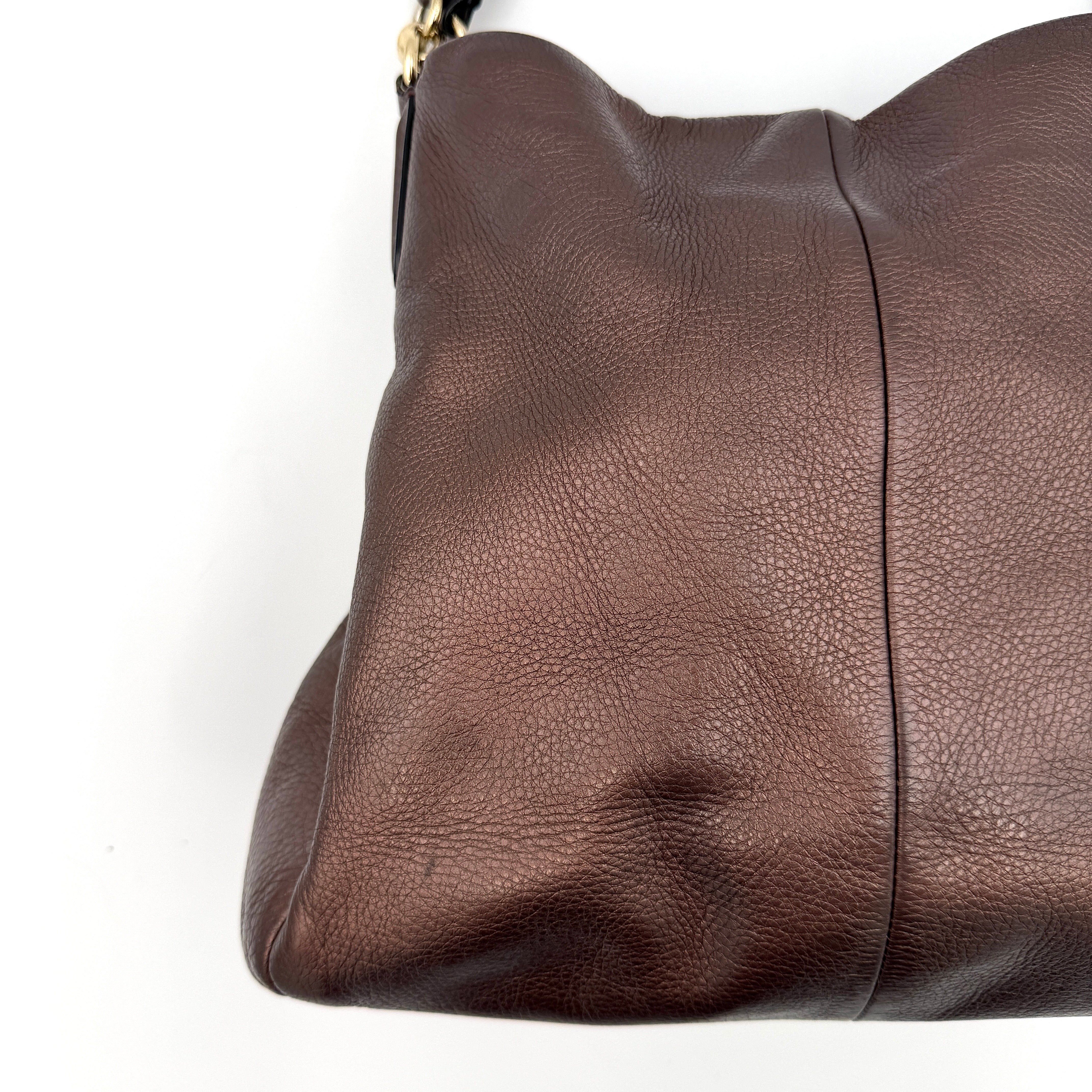 Coach Madison Phoebe Shoulder Bag in rich brown pebbled leather with double shoulder straps and gold-tone hardware, shown upright against a white backdrop.