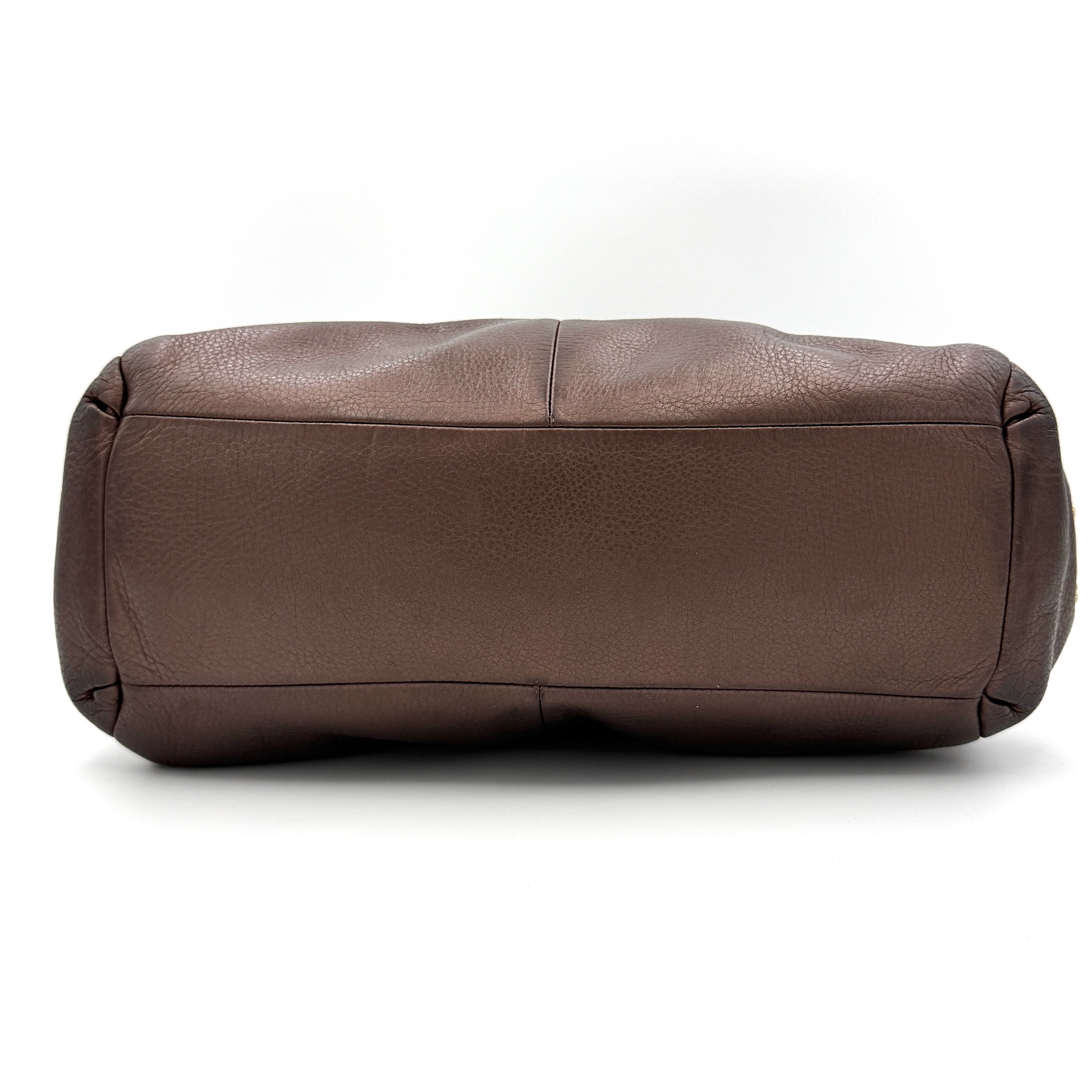 Coach Madison Phoebe Shoulder Bag in rich brown pebbled leather with double shoulder straps and gold-tone hardware, shown upright against a white backdrop.