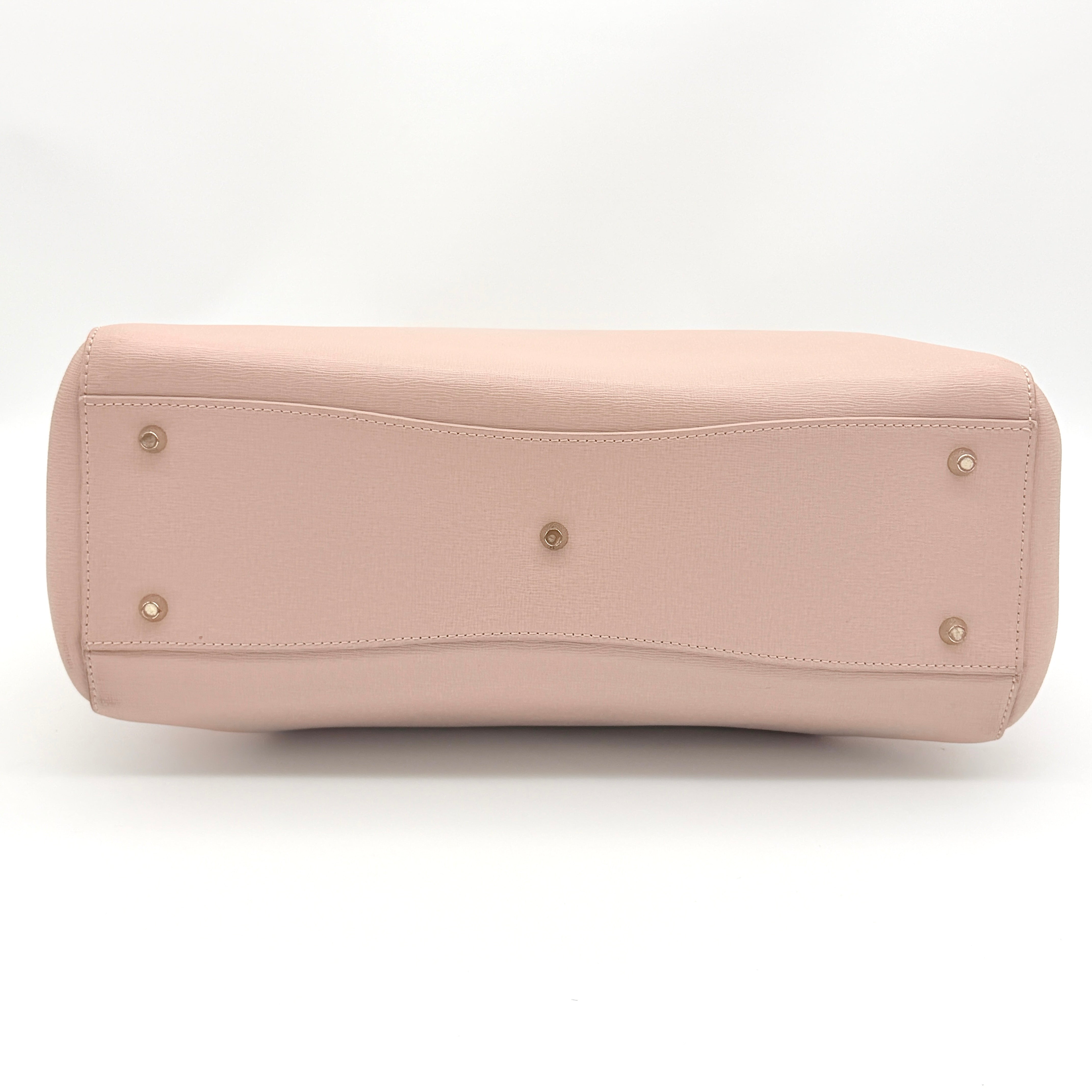 Furla Tessa handbag in light pink leather with gold hardware and double top handles.
