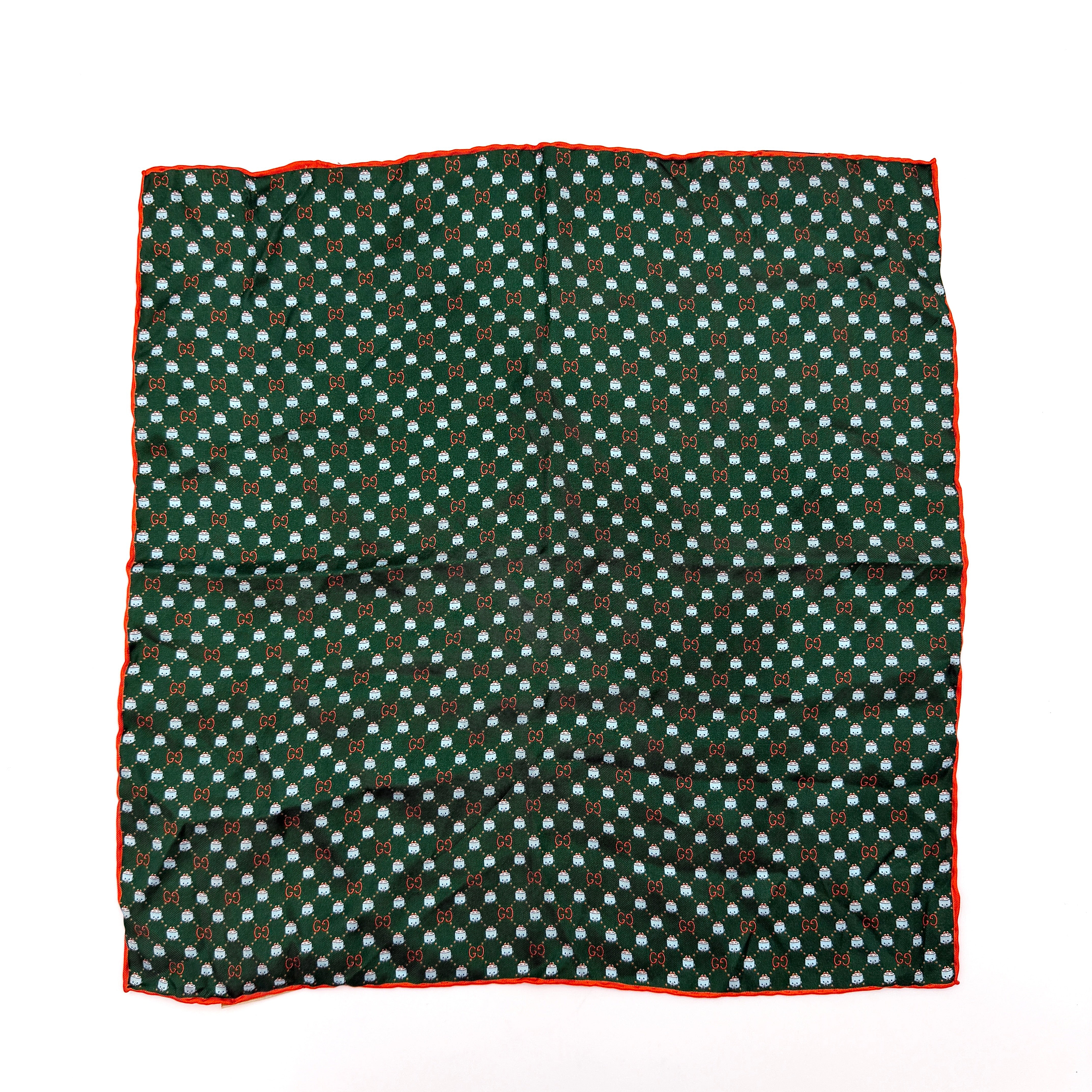 Gucci GG Monogram Silk Scarf in green silk, featuring a playful allover GG pattern and orange rolled edge.