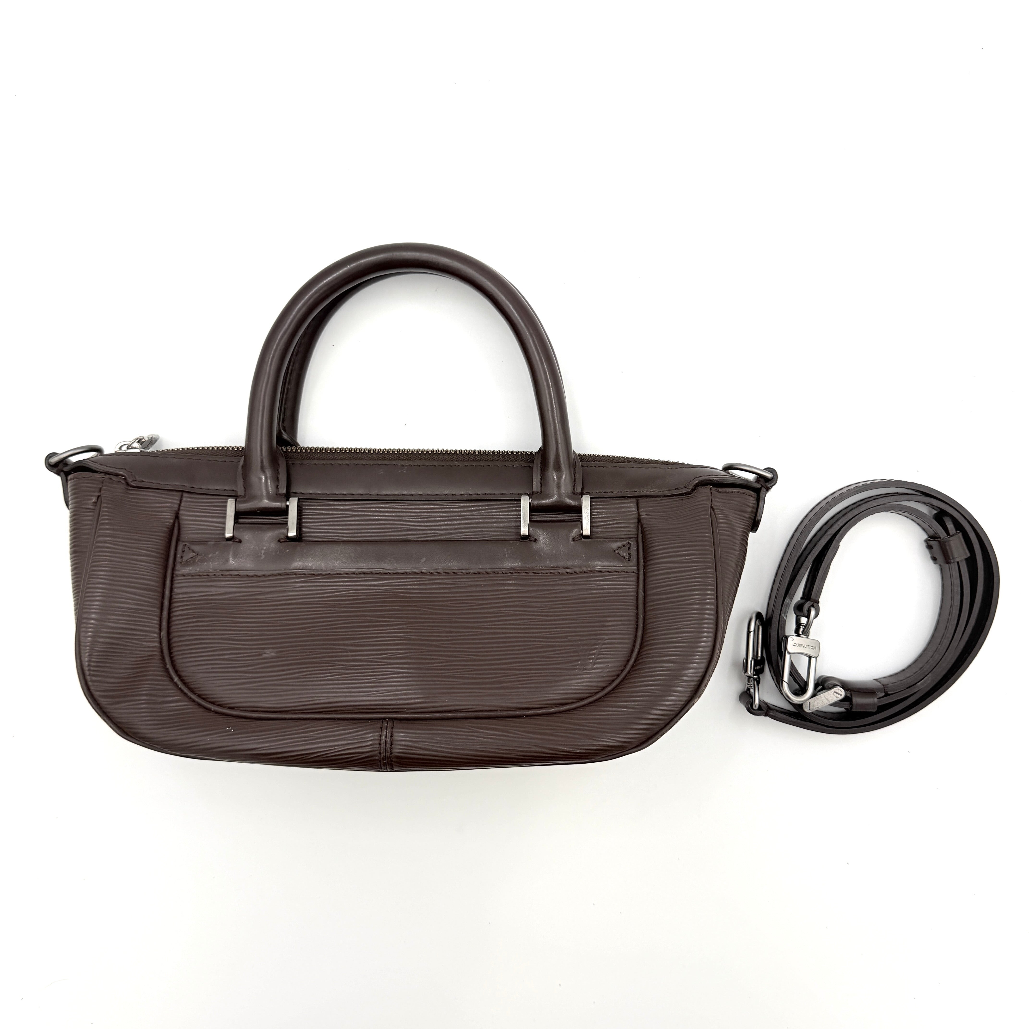 Louis Vuitton Dhanura PM 2Way shoulder bag in brown Epi leather with detachable strap and silver-tone hardware.