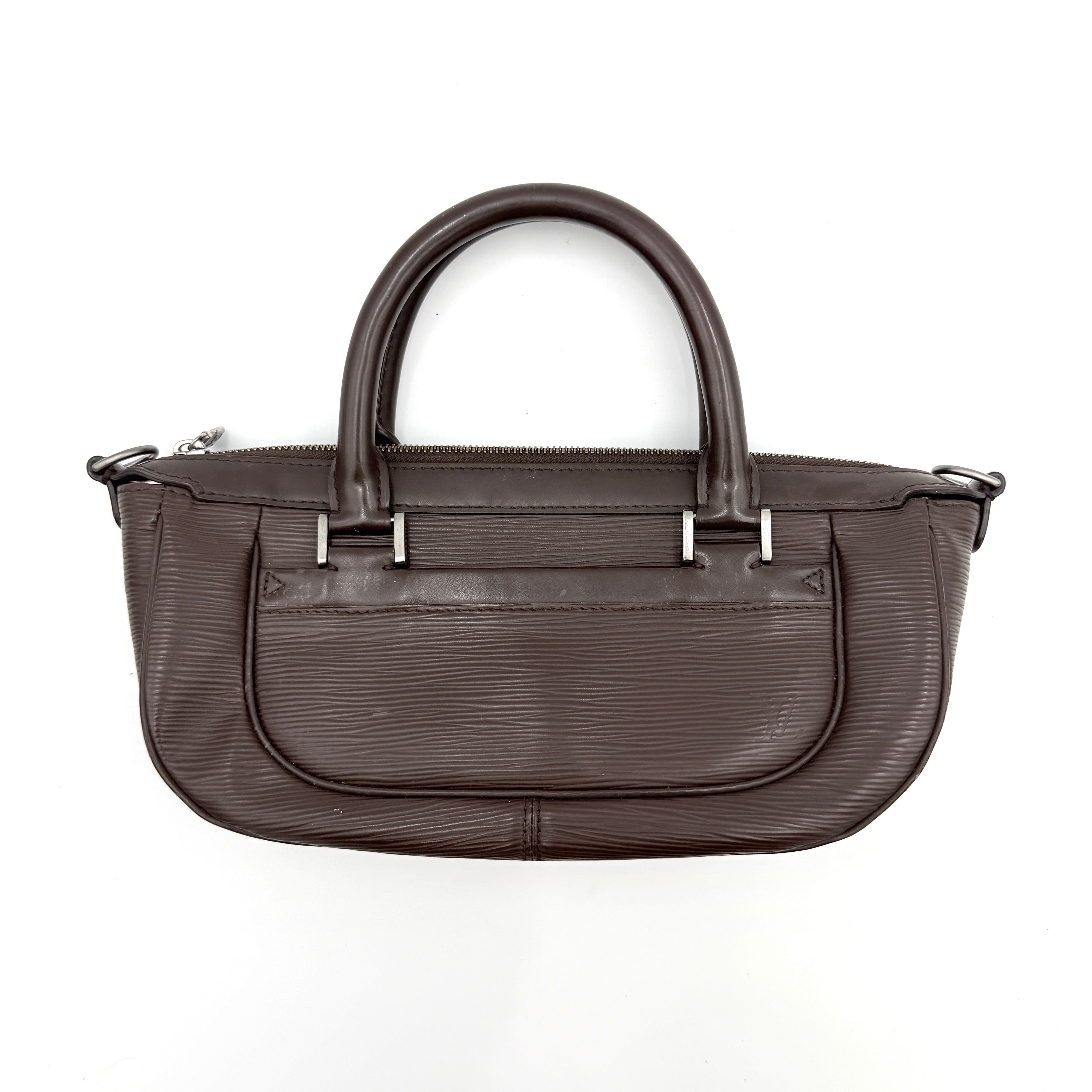 Louis Vuitton Dhanura PM 2Way shoulder bag in brown Epi leather with detachable strap and silver-tone hardware.