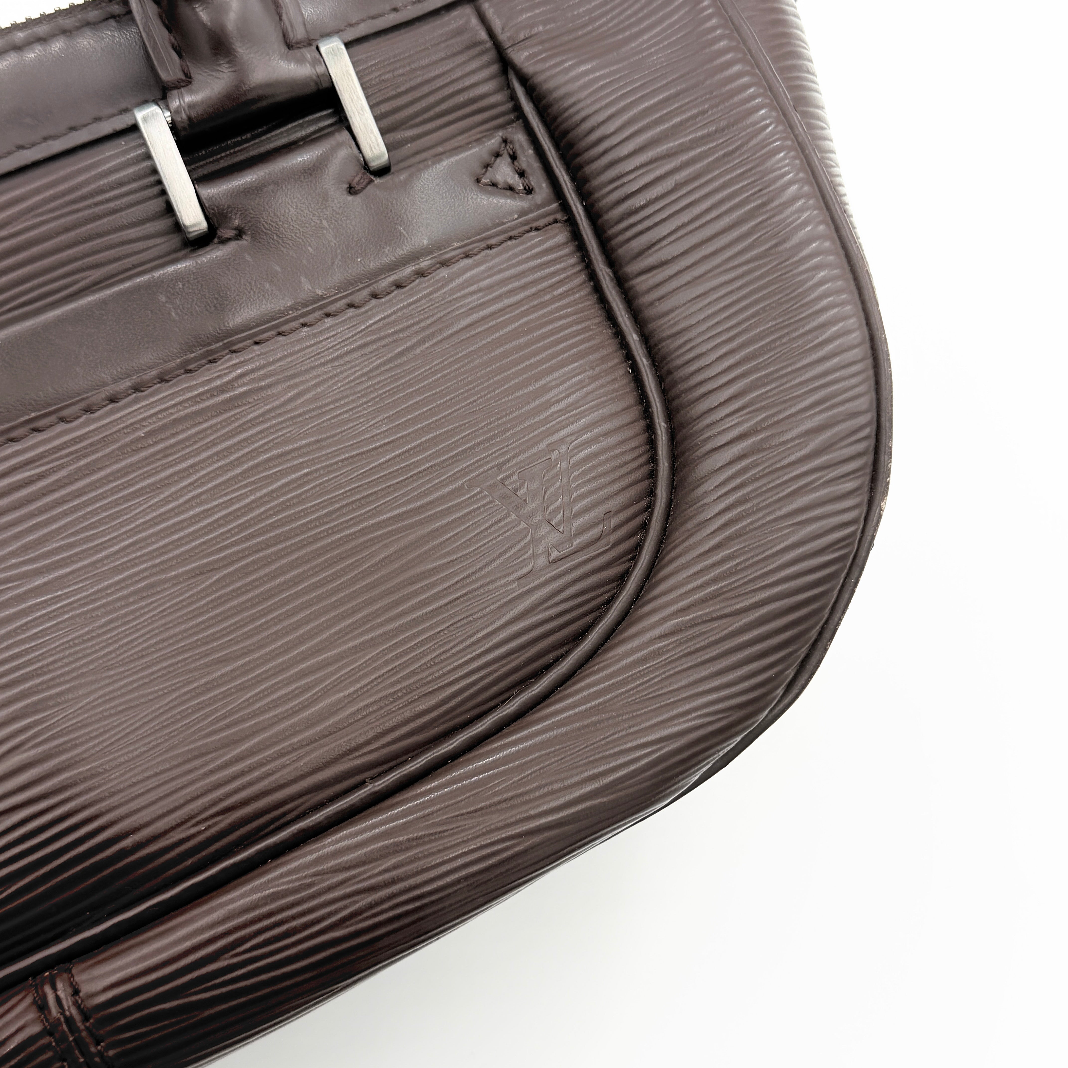 Louis Vuitton Dhanura PM 2Way shoulder bag in brown Epi leather with detachable strap and silver-tone hardware.