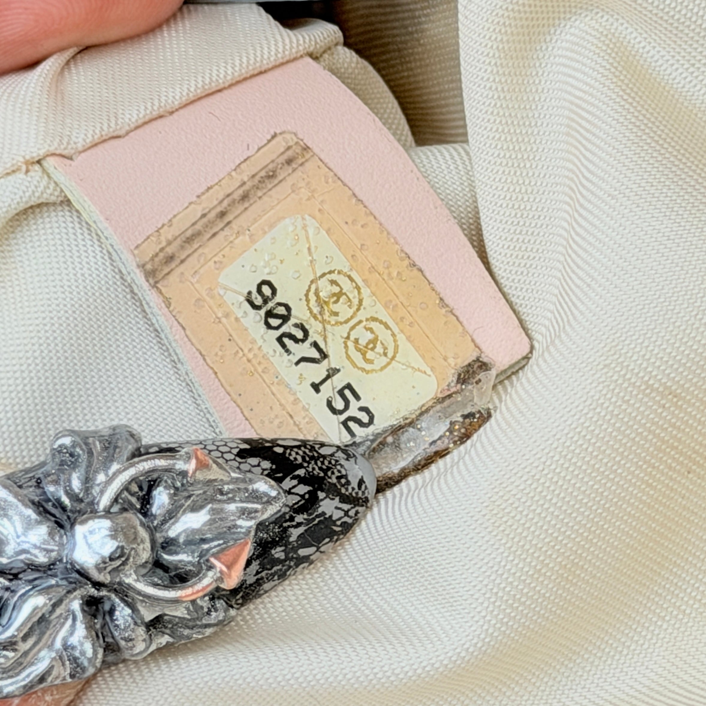 Chanel New Travel Line Tote Bag in rose gold jacquard with blush leather handles, displayed against a white background.