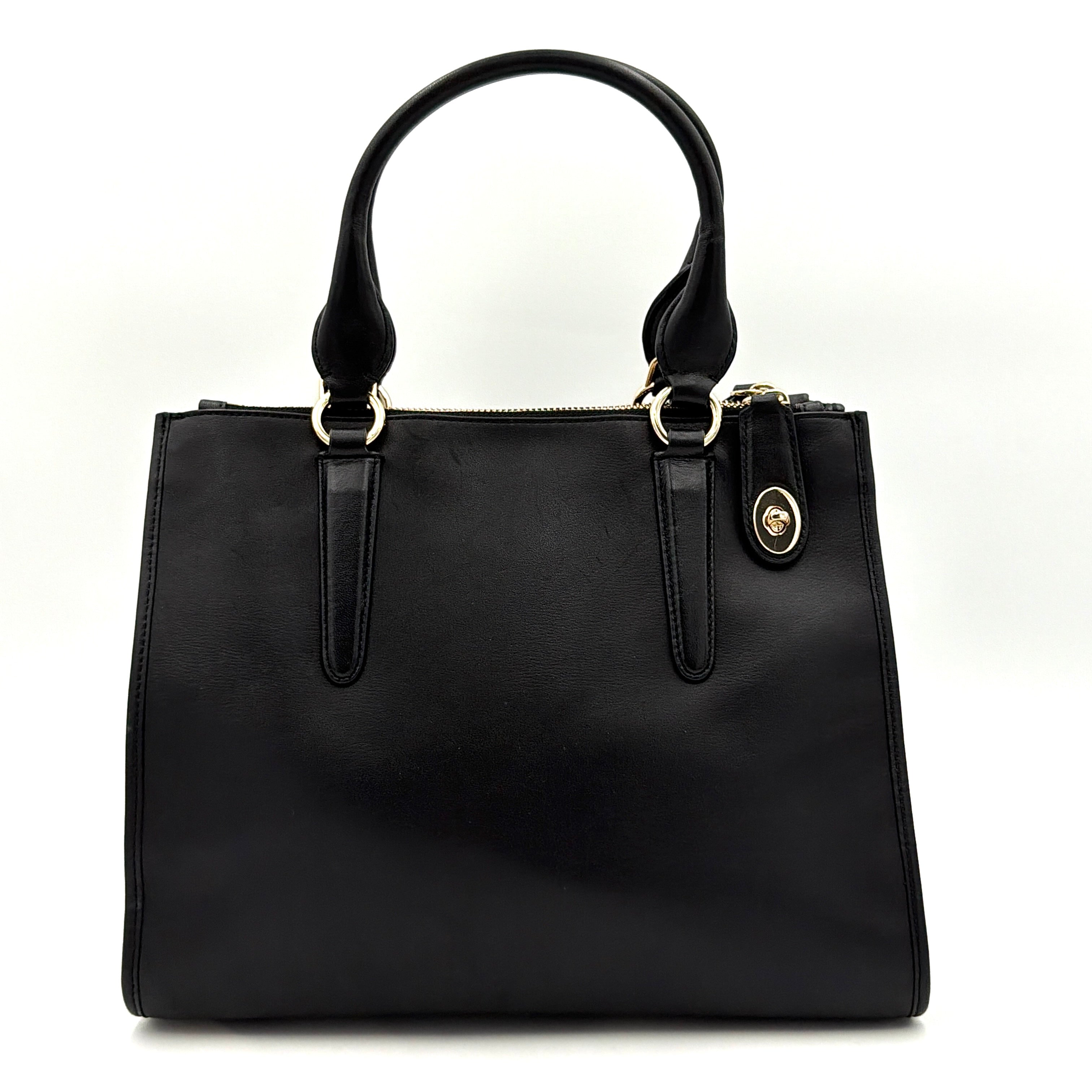 Coach Crosby Carryall Handbag in smooth black leather with gold-tone hardware and a structured silhouette.