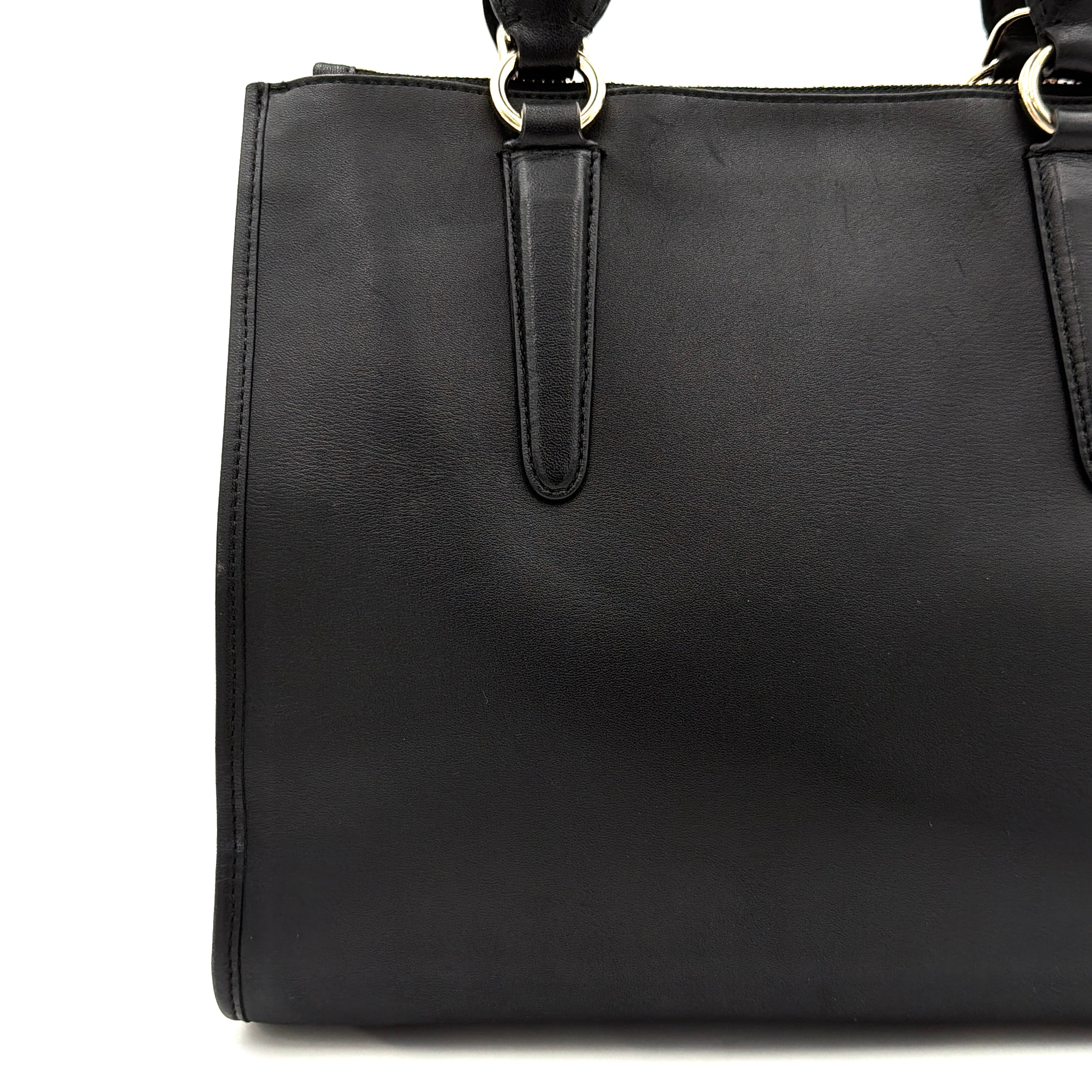 Coach Crosby Carryall Handbag in smooth black leather with gold-tone hardware and a structured silhouette.