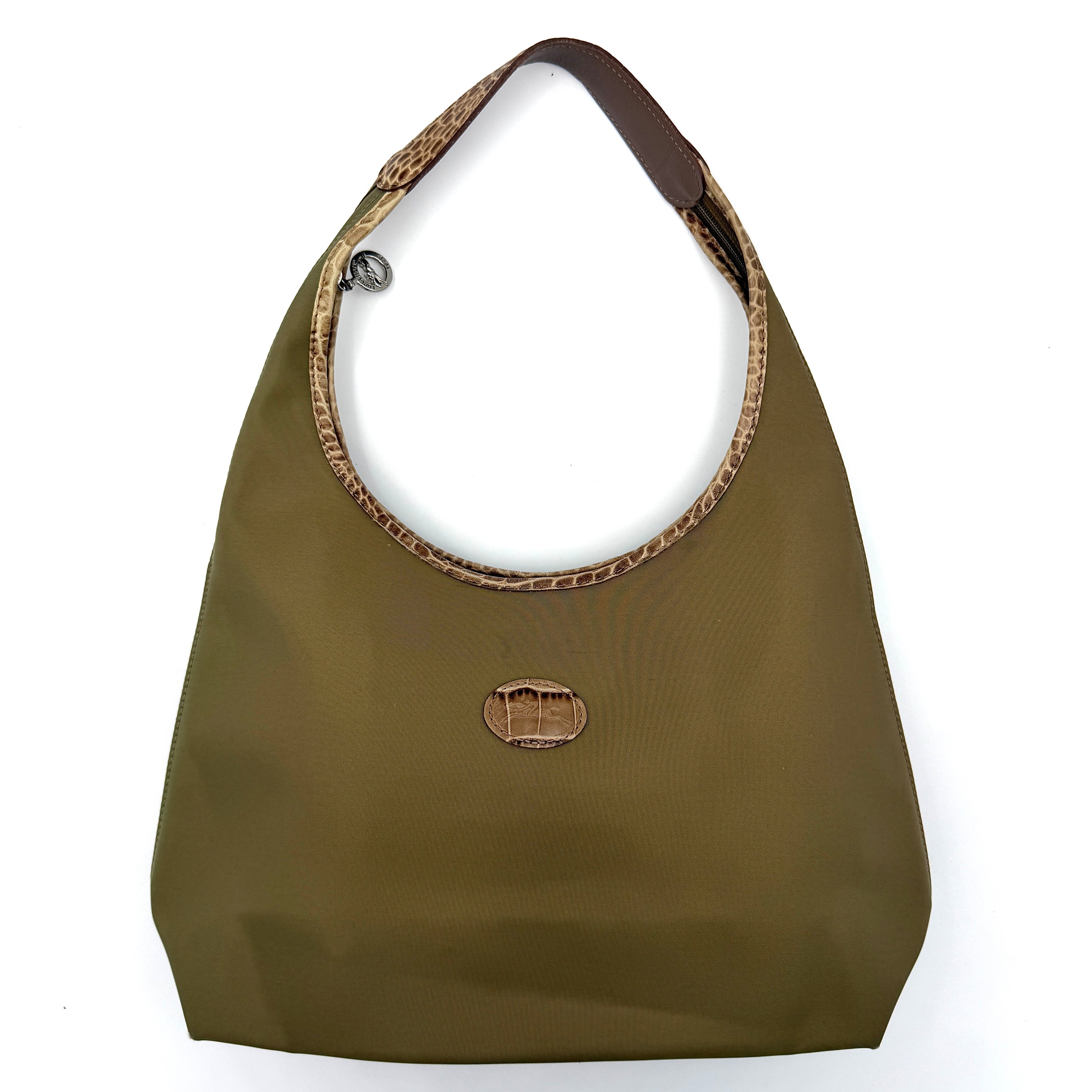 Longchamp Sac Porte Epaule hobo shoulder bag in brown nylon with lizard-embossed leather trim and a wide single handle.