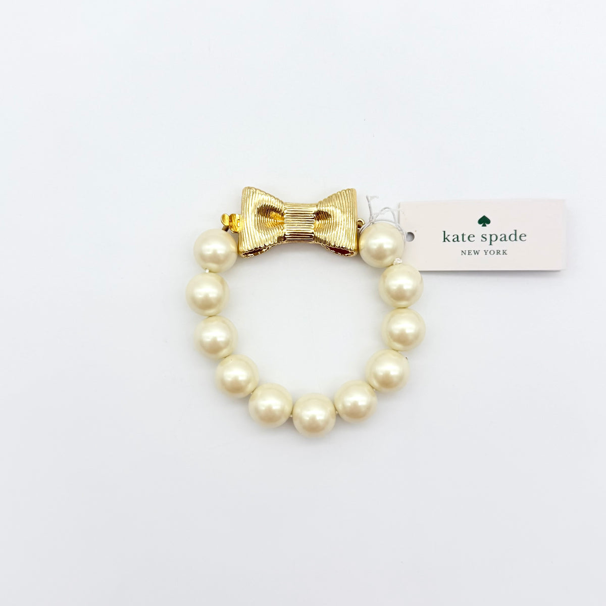 Kate Spade All Wrapped Up Pearl Gold Bow Bracelet