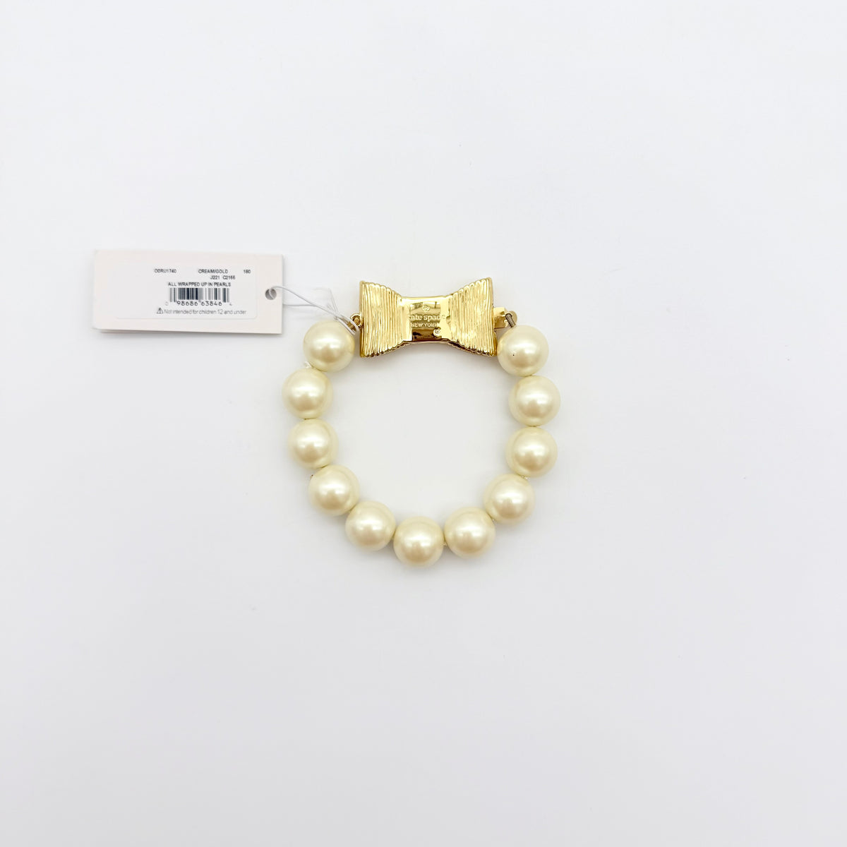 Kate Spade All Wrapped Up Pearl Gold Bow Bracelet