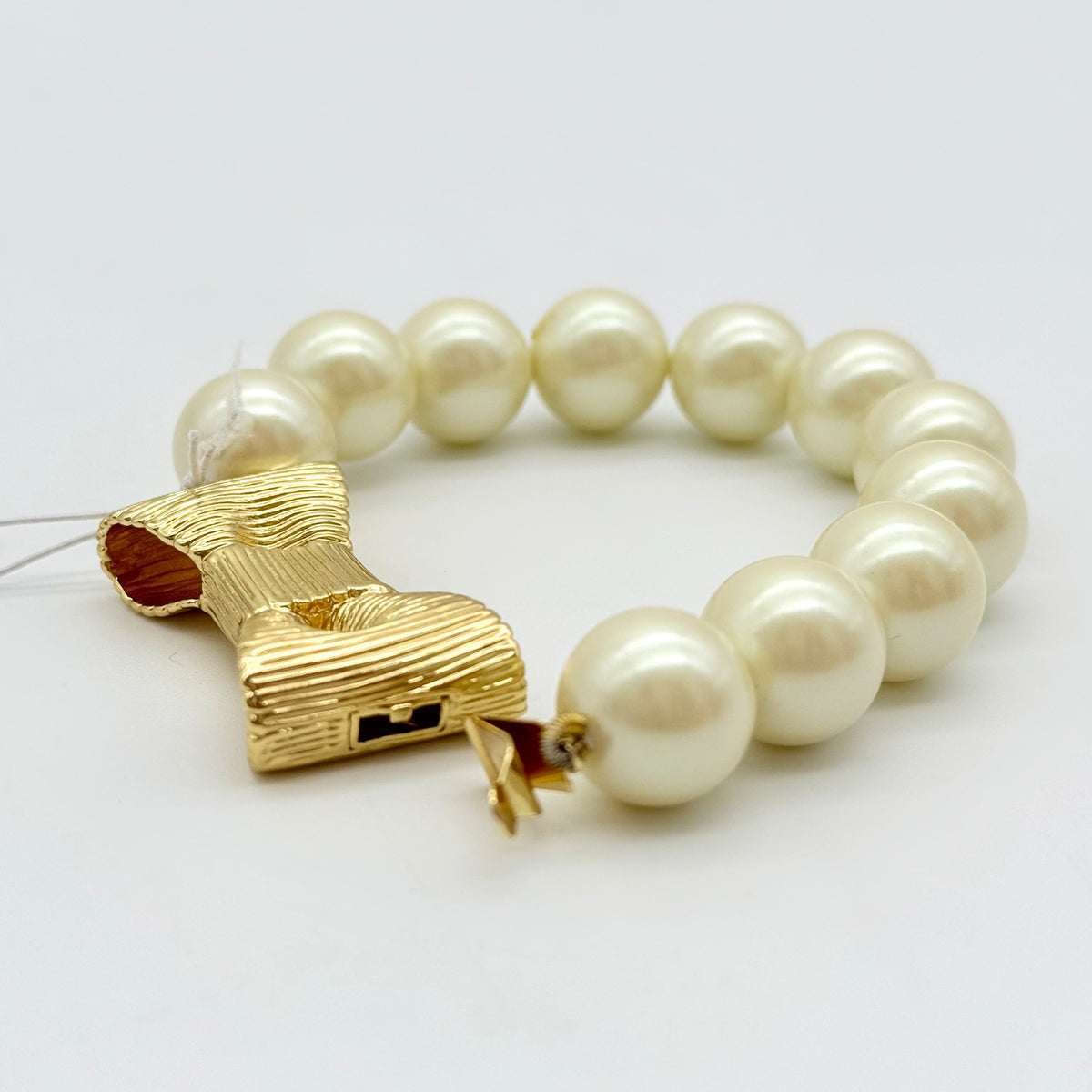 Kate Spade All Wrapped Up Pearl Gold Bow Bracelet