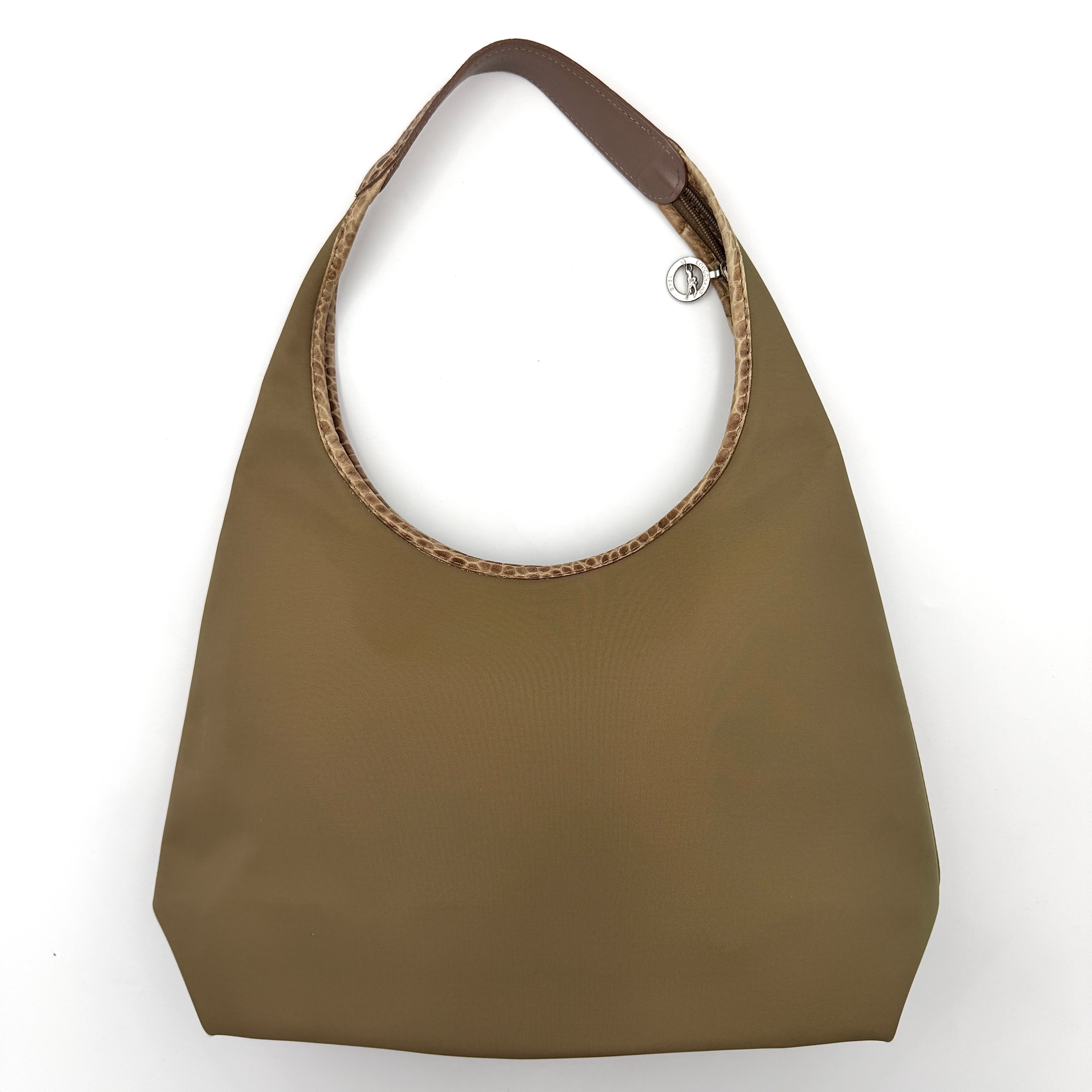 Longchamp Sac Porte Epaule hobo shoulder bag in brown nylon with lizard-embossed leather trim and a wide single handle.