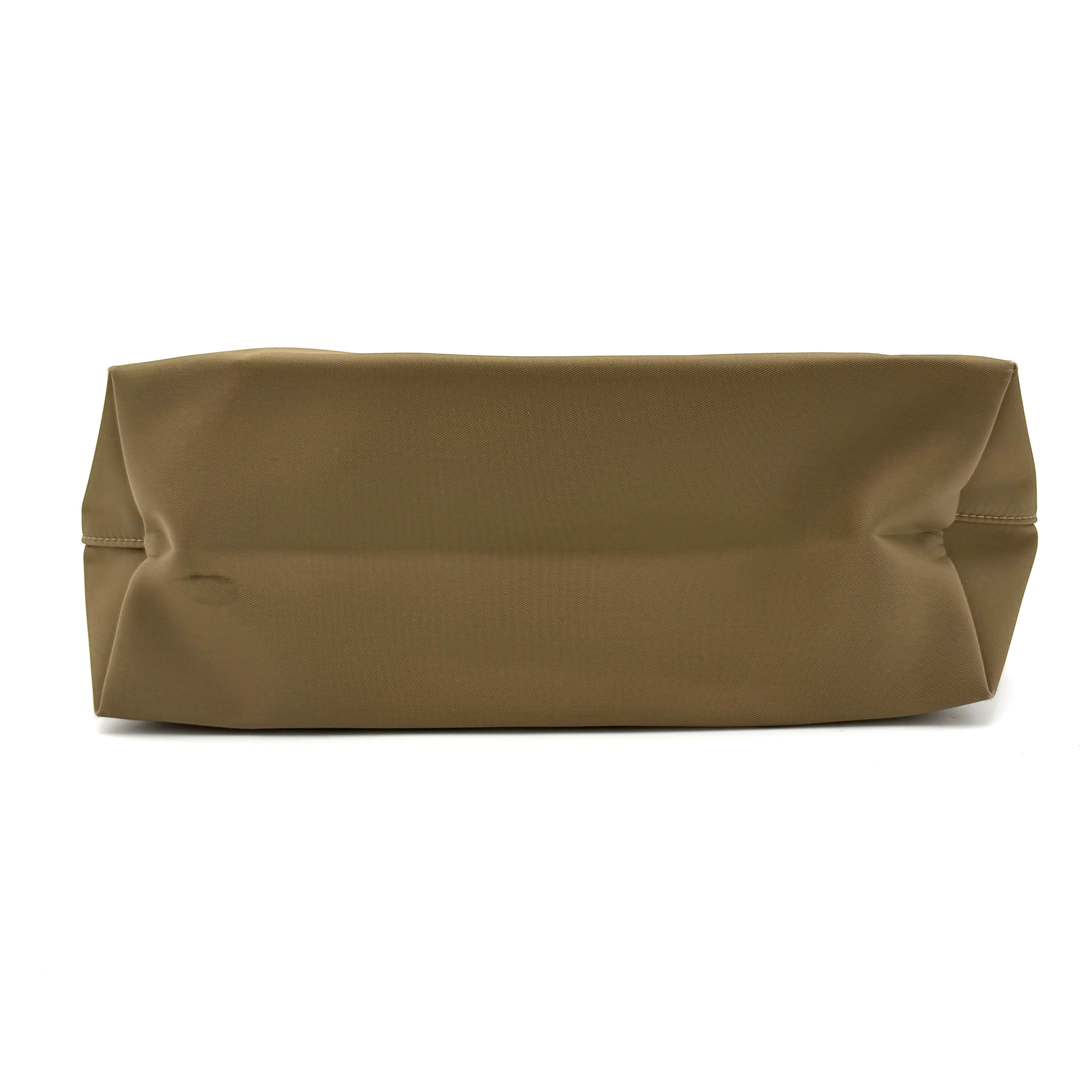Longchamp Sac Porte Epaule hobo shoulder bag in brown nylon with lizard-embossed leather trim and a wide single handle.