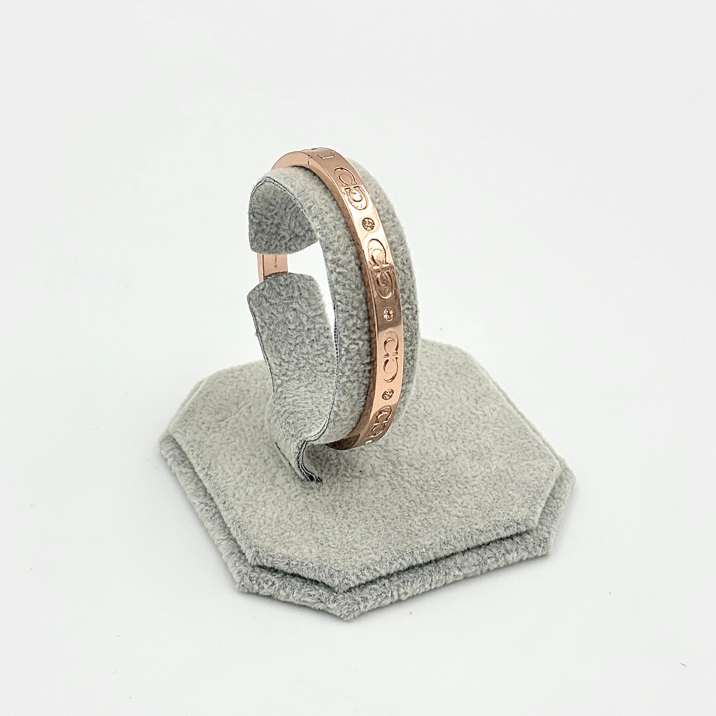 Coach Signature Kissing C Hinged Bangle Bracelet Rose Gold