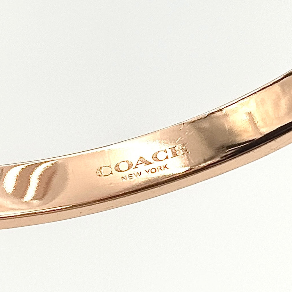 Coach Signature Kissing C Hinged Bangle Bracelet Rose Gold