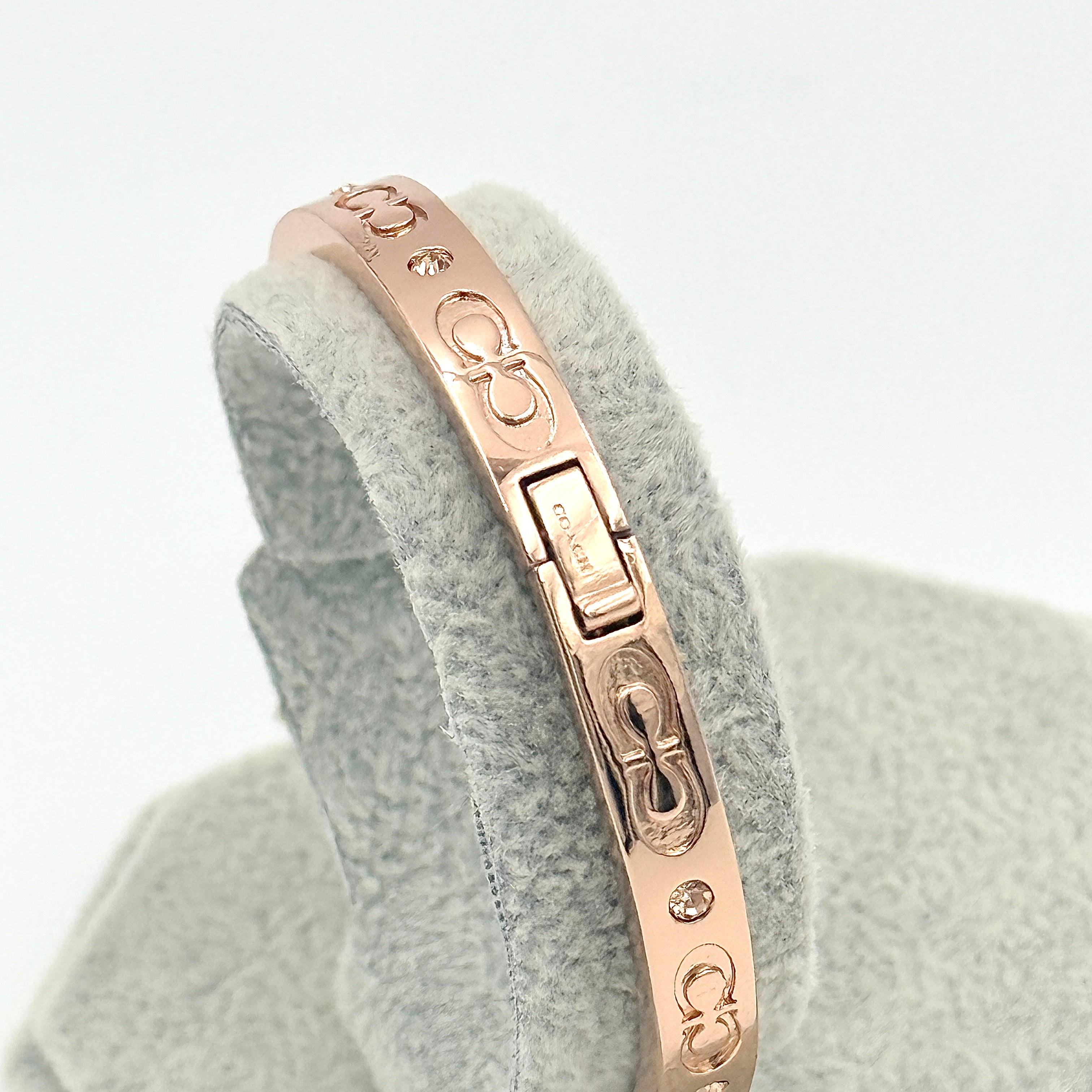 Coach Signature Kissing C Hinged Bangle Bracelet Rose Gold