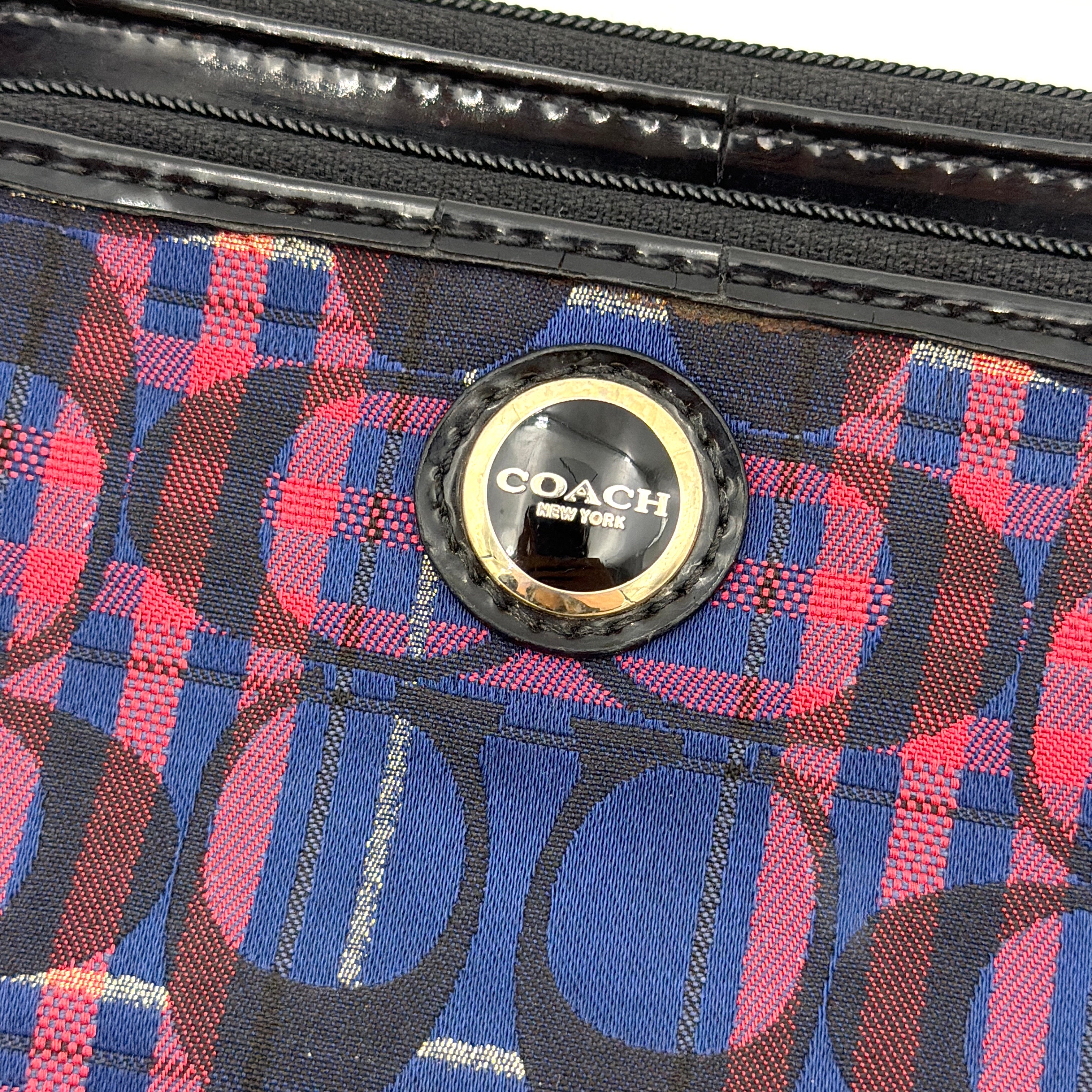 Coach Poppy Tartan Plaid Pouch in multicolour jacquard with bold red and navy check and blue hang tags.