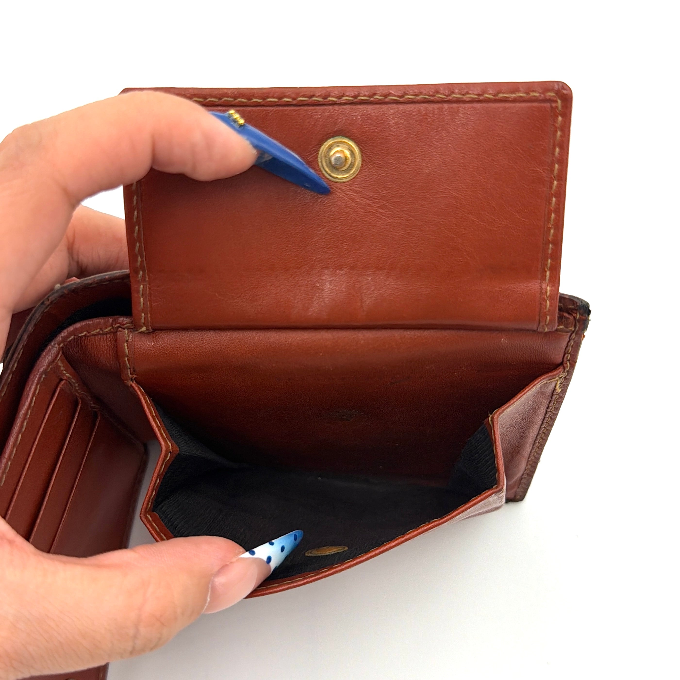Fendi Pequin Stripe wallet in brown and black canvas with cognac leather trim and circular Fendi badge on the front.