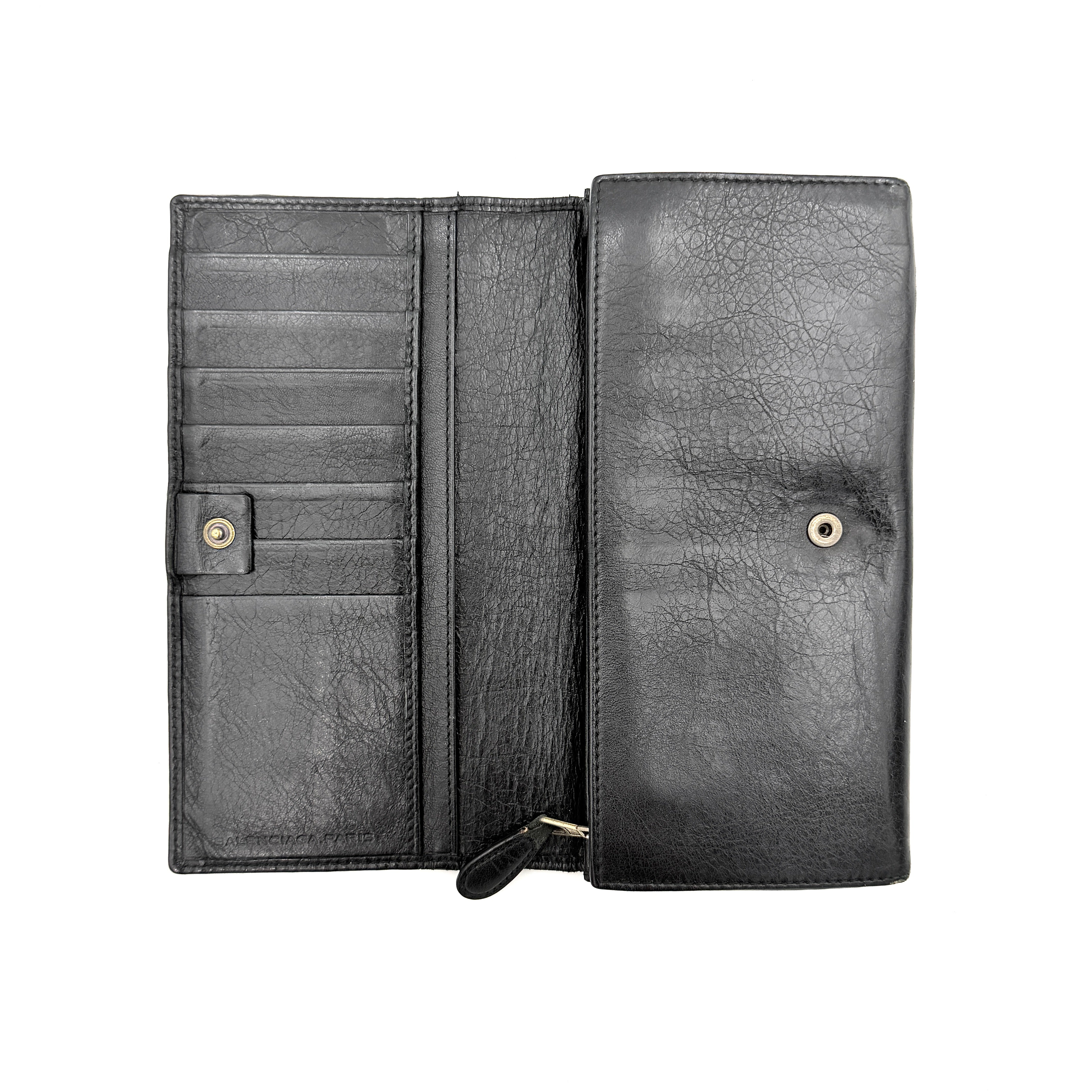 Balenciaga Motorcycle Studded Long Wallet in black distressed leather with signature brass studs and buckle details.