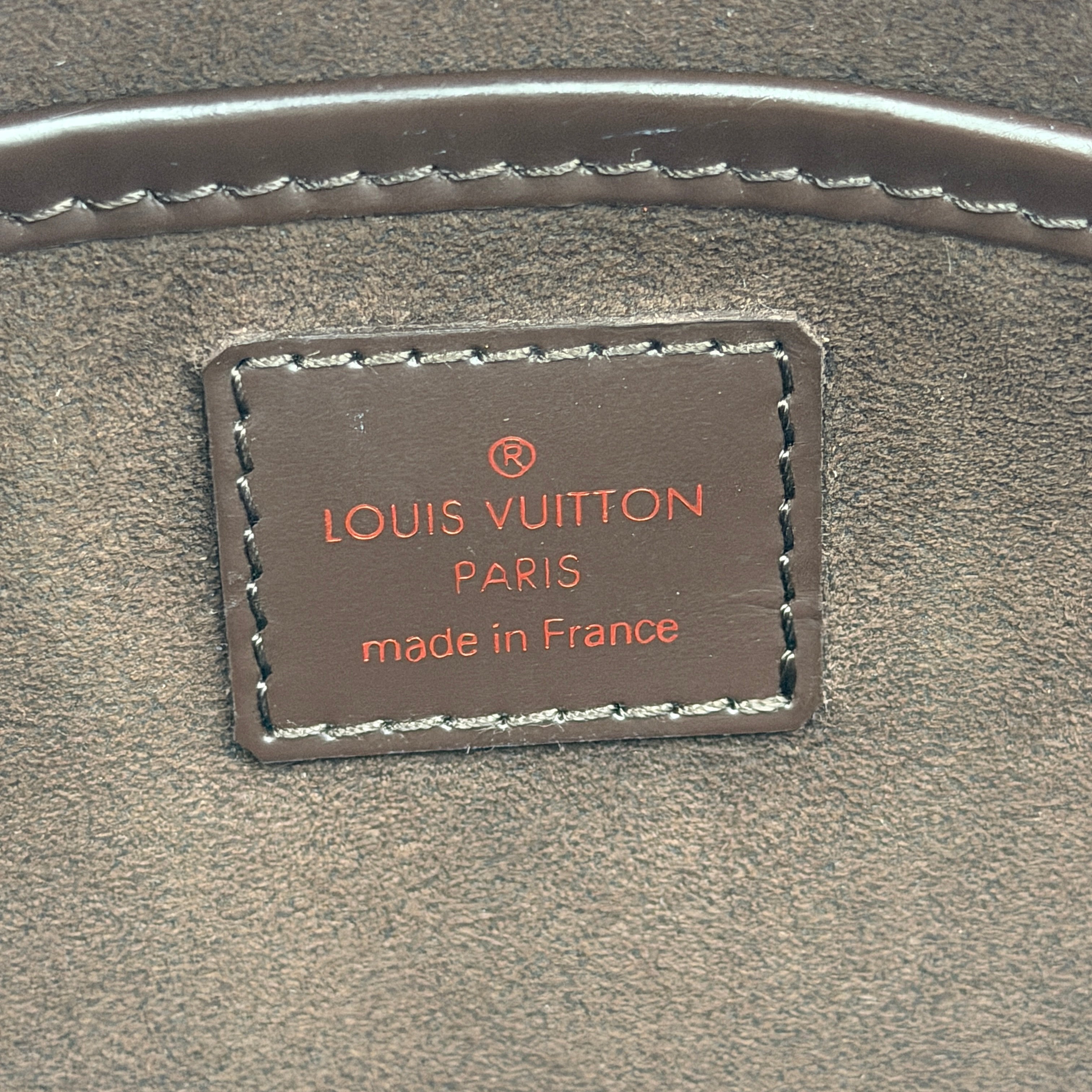 Louis Vuitton Saint Louis Damier Clutch Bag in brown Damier Ebene canvas with chocolate leather trim and gold-tone hardware, photographed on white background.