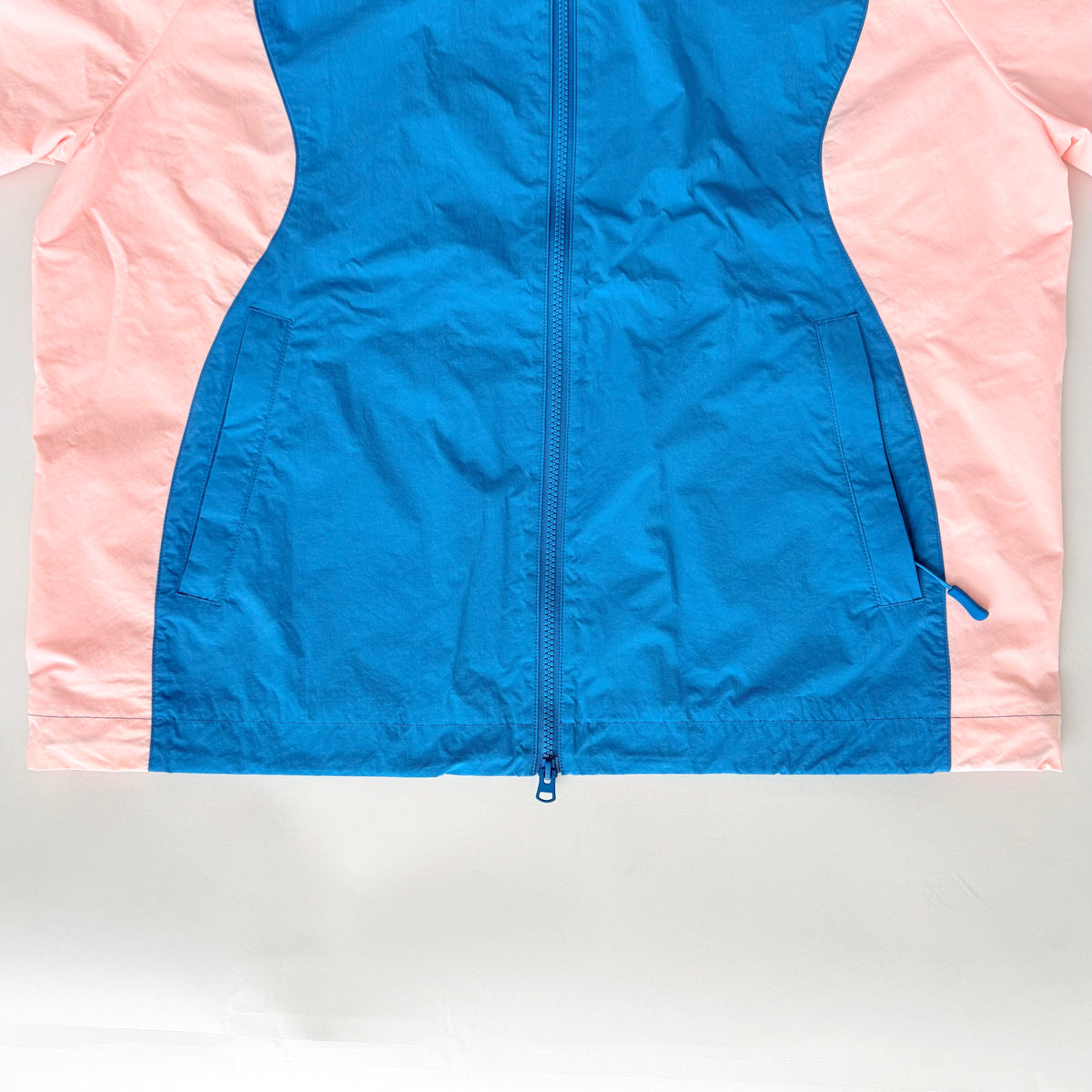 (L) Undefeated Lightweight Hooded Windbreaker Jacket Blue/Pink
