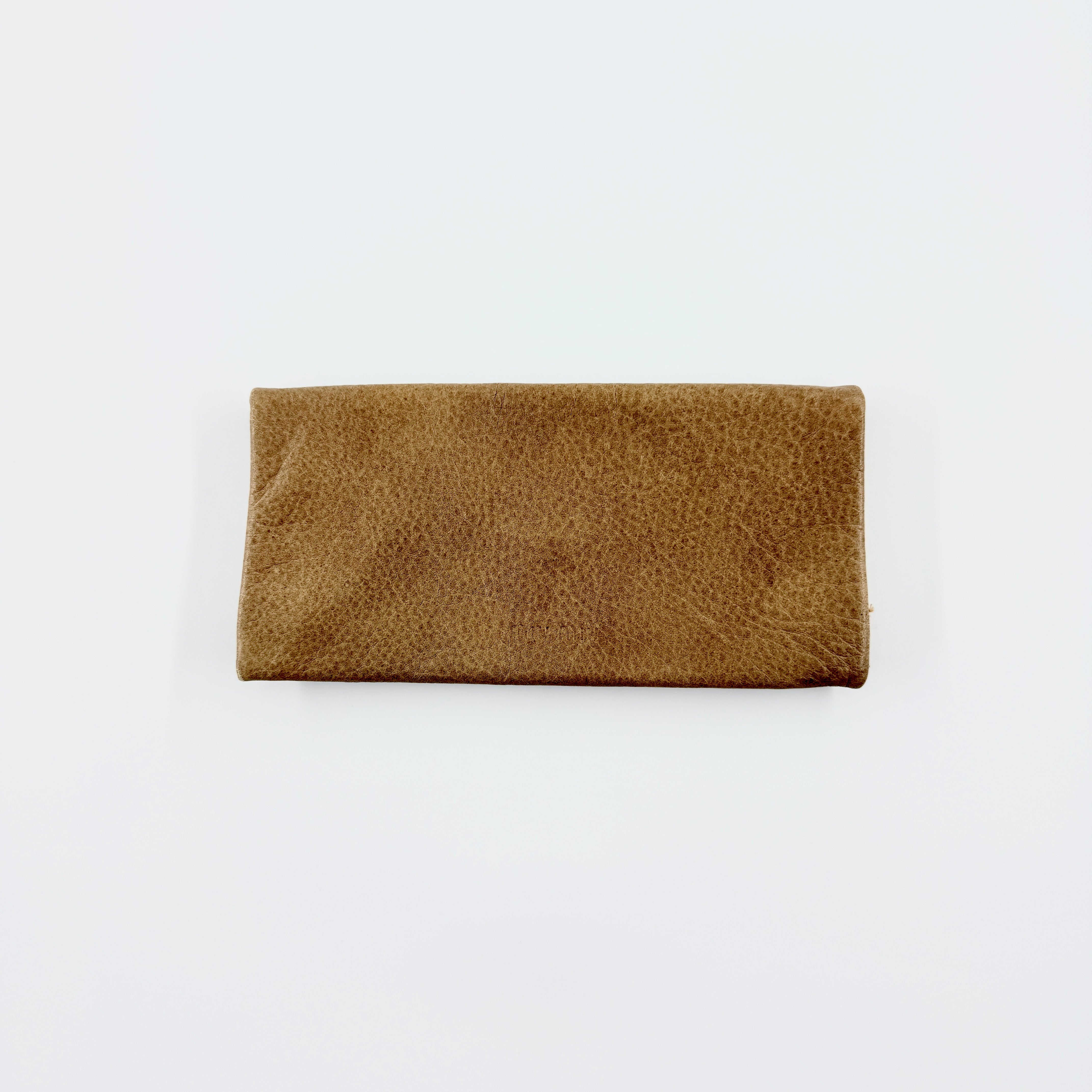 Miu Miu brown textured leather foldover pouch with matte black studs, zip closure, and slim silhouette.