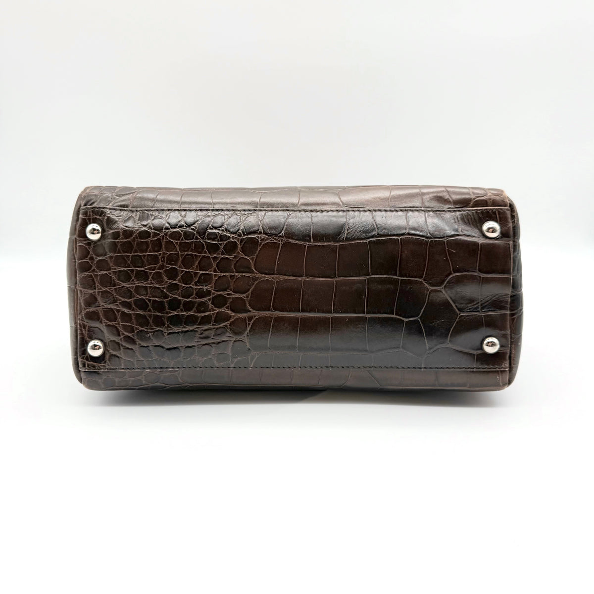 Furla dark brown croc-embossed leather handbag with silver-tone hardware and double top handles, photographed against a clean white background.