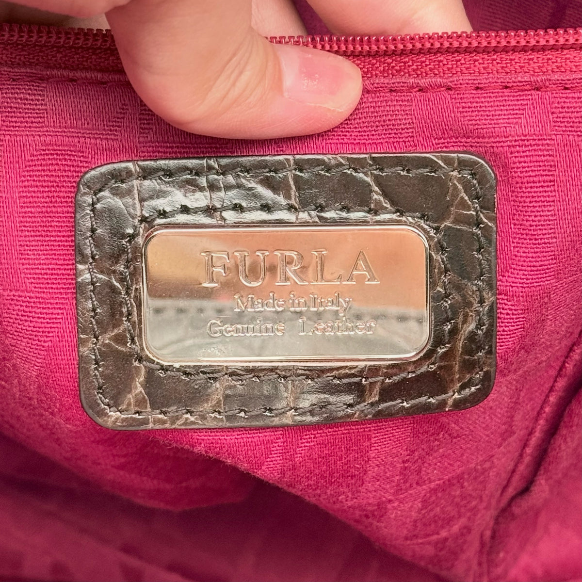 Furla dark brown croc-embossed leather handbag with silver-tone hardware and double top handles, photographed against a clean white background.
