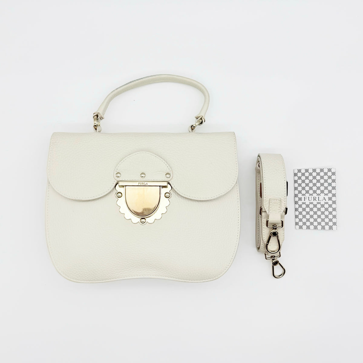 Furla 2Way Ducale Mini Handbag in creamy white leather with gold hardware, top handle, and detachable strap displayed flat with authenticity card.