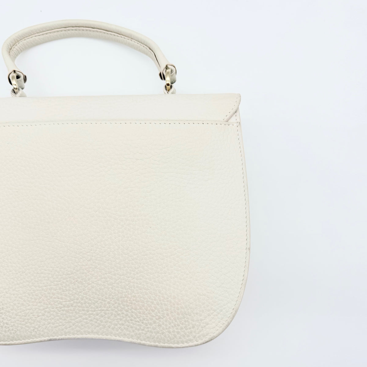 Furla 2Way Ducale Mini Handbag in creamy white leather with gold hardware, top handle, and detachable strap displayed flat with authenticity card.