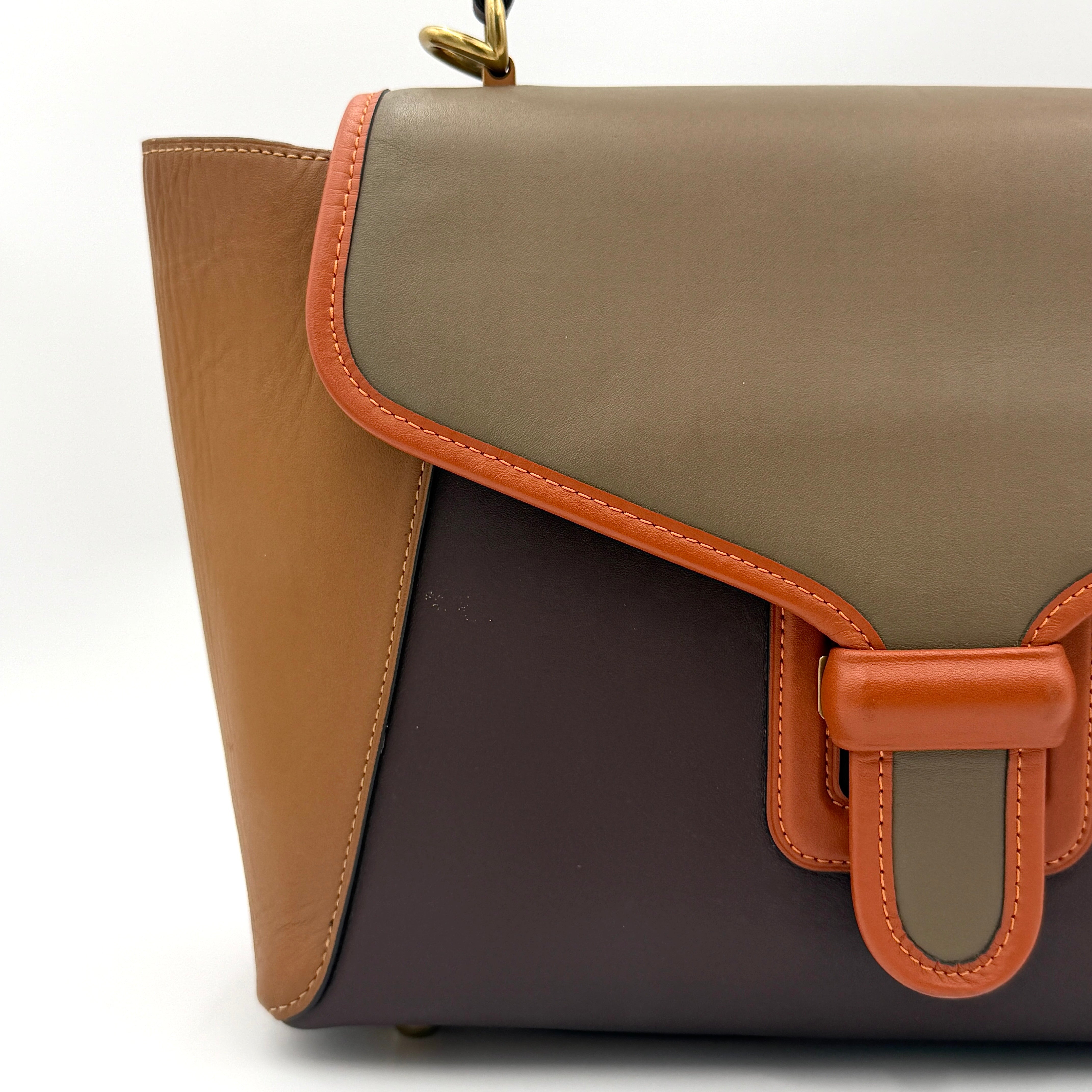 Coach 2Way Courier Carryall in brown and olive green colorblock leather with a structured silhouette, top handle, and detachable strap.