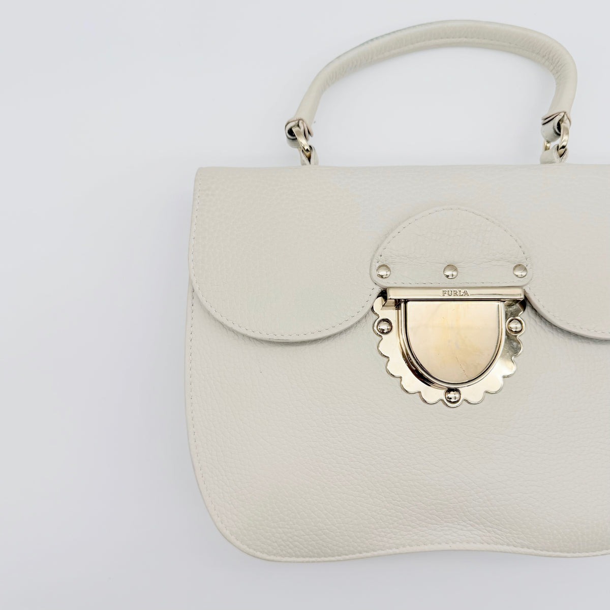 Furla 2Way Ducale Mini Handbag in creamy white leather with gold hardware, top handle, and detachable strap displayed flat with authenticity card.