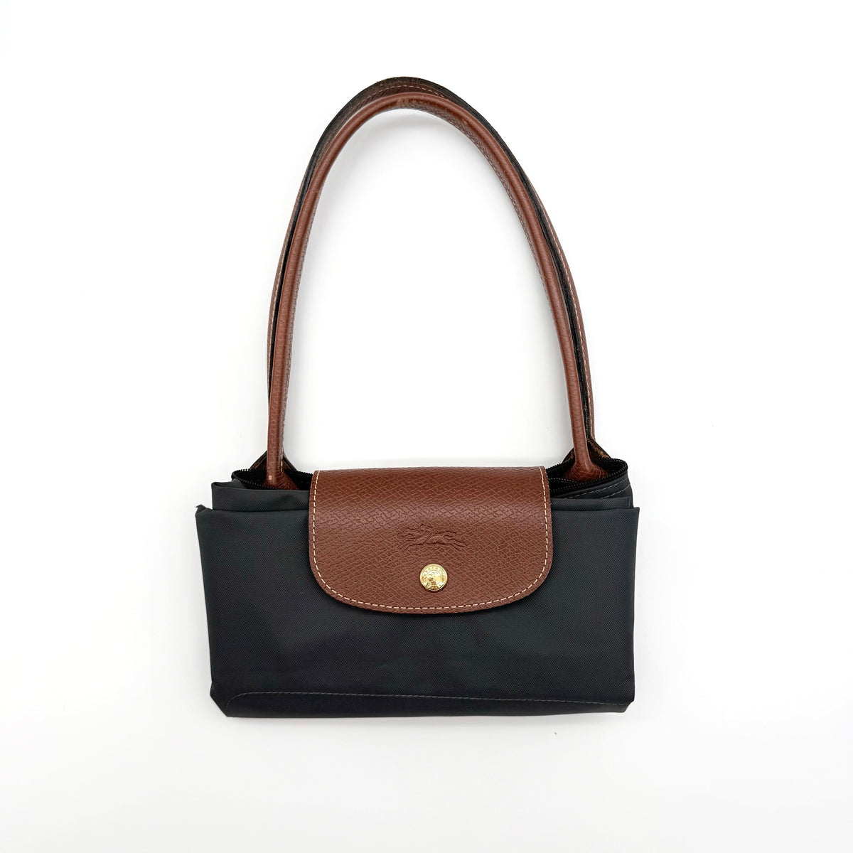 Longchamp Le Pliage Original Tote Bag in grey nylon with brown leather handles and flap, displayed against a white background.