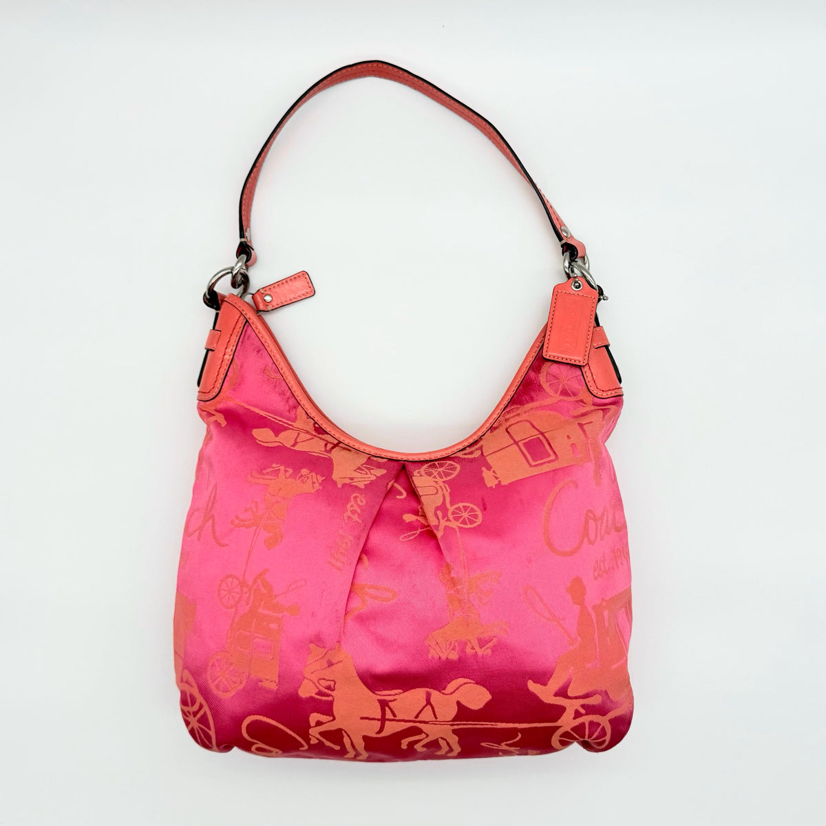 Coach pink and orange Horse & Carriage sateen hobo shoulder bag with detachable strap and leather trim.