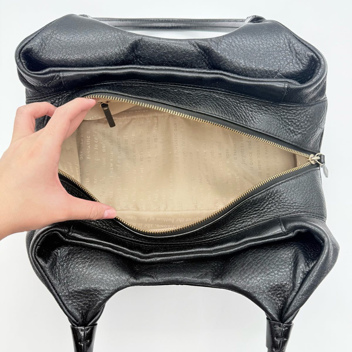 Kate Spade New York Stevie Berkshire Road Shoulder Bag in black pebbled leather with gold-tone hardware and double top handles.