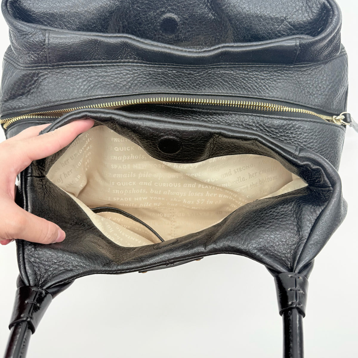 Kate Spade New York Stevie Berkshire Road Shoulder Bag in black pebbled leather with gold-tone hardware and double top handles.