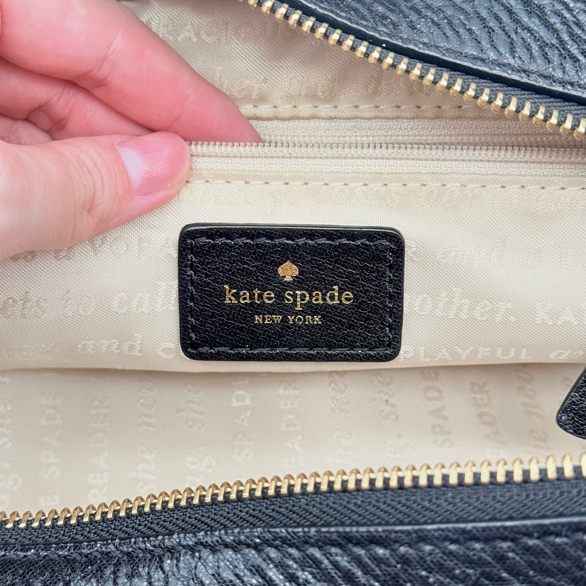 Kate Spade New York Stevie Berkshire Road Shoulder Bag in black pebbled leather with gold-tone hardware and double top handles.