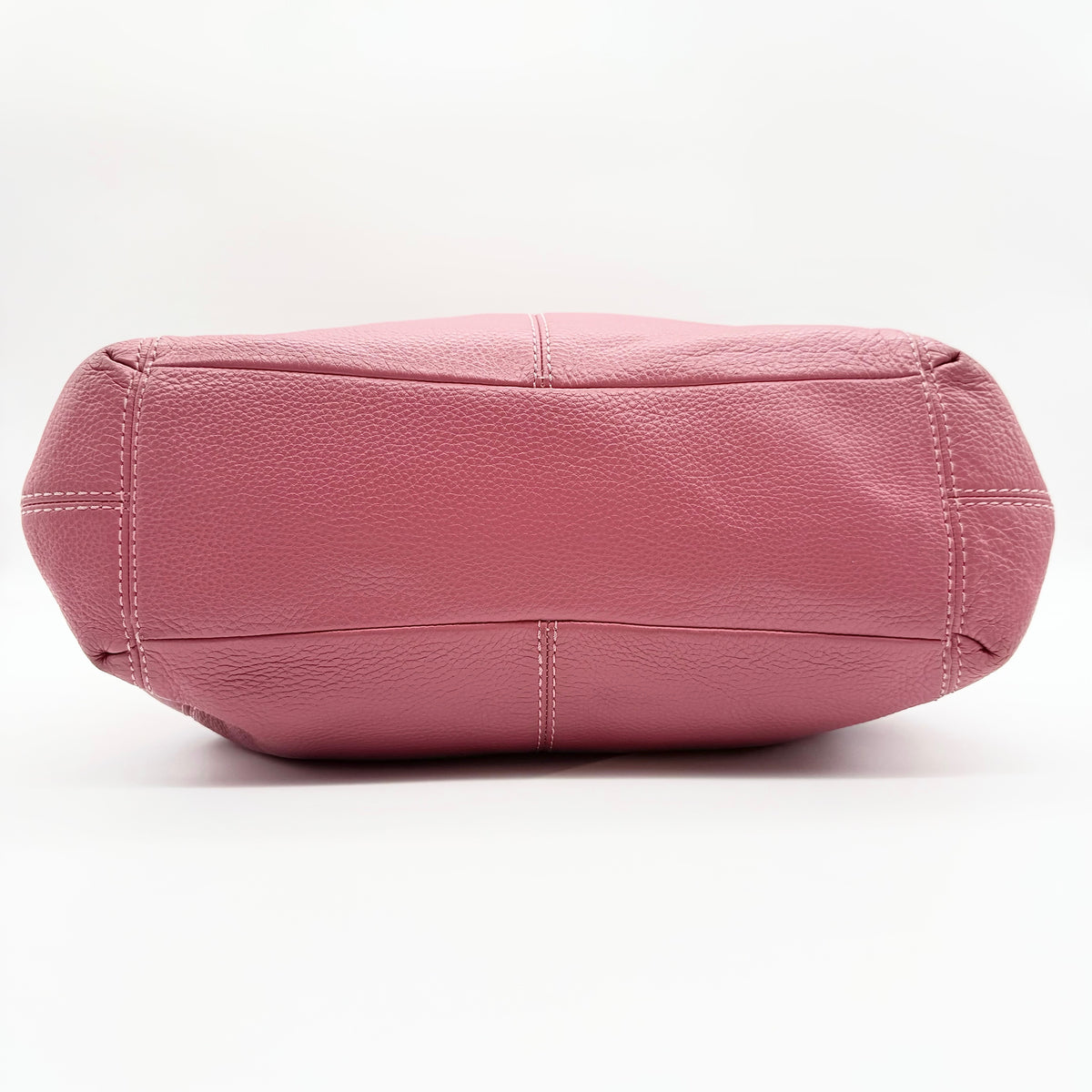Coach Lexy Shoulder Bag in pink pebbled leather with gold hardware and dual straps, shown against a white background.