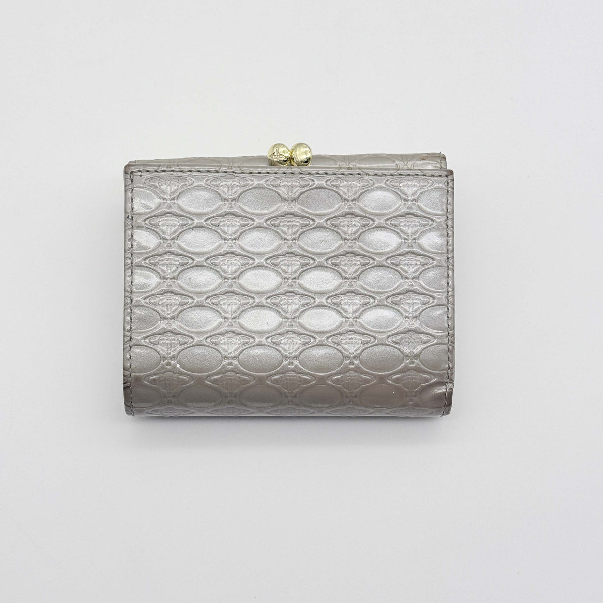 Vivienne Westwood grey trifold wallet with embossed orb monogram and silver metal logo on flap.